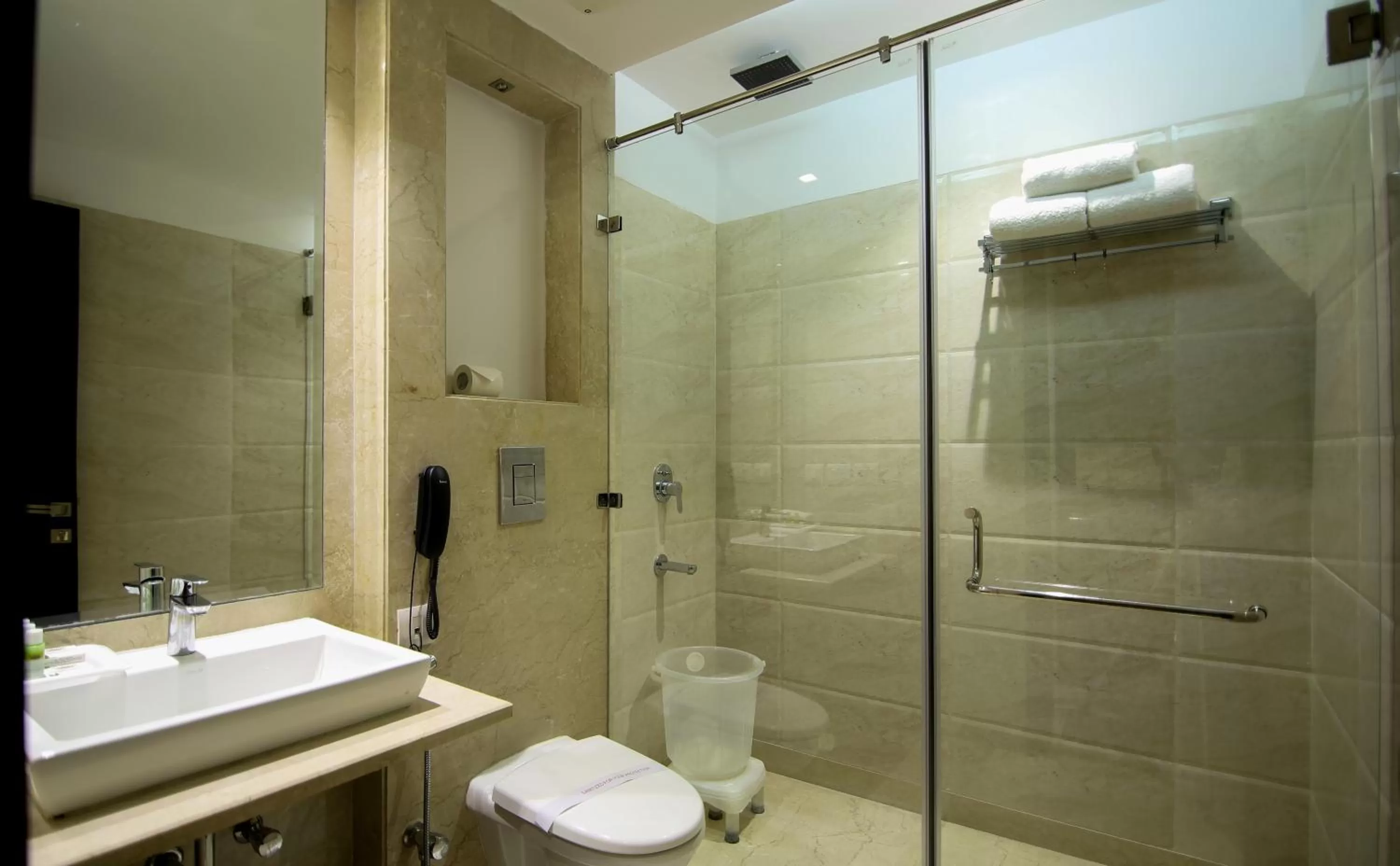 Bathroom in Hotel The Prime Balaji Deluxe, City Centre, With Free Airport Pickup