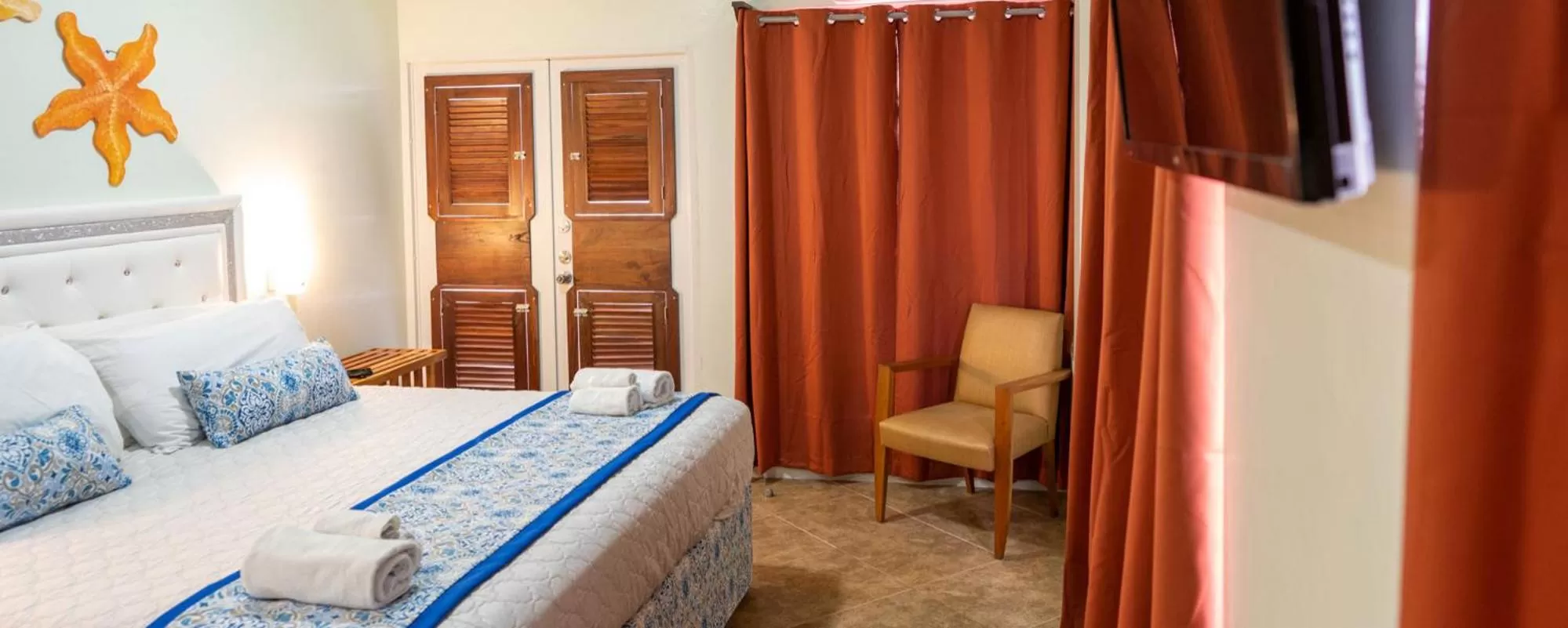 Bed in Island Magic Beach Resort