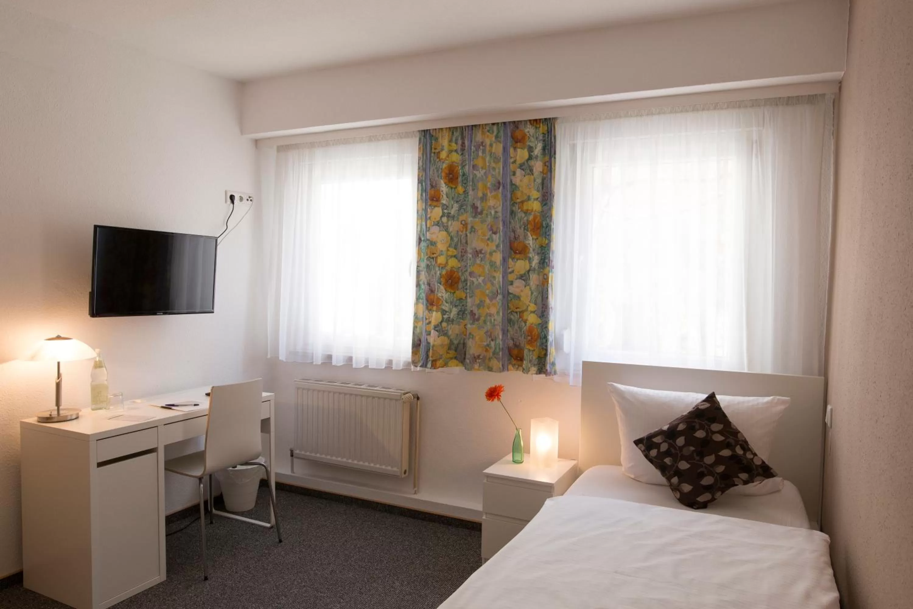 Photo of the whole room, Bed in Altstadthotel Fürth