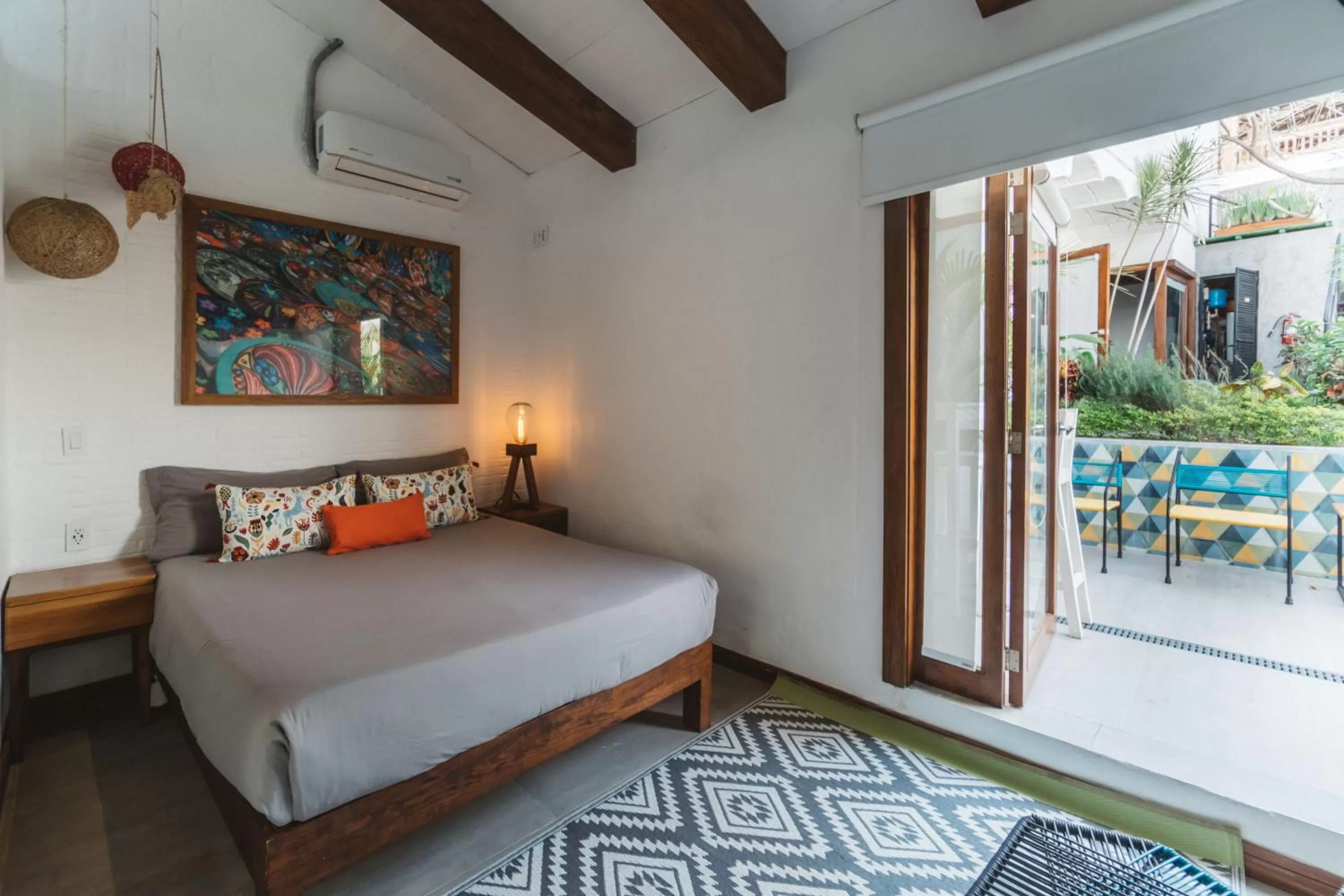 Bed in Amaia Boutique Hotel