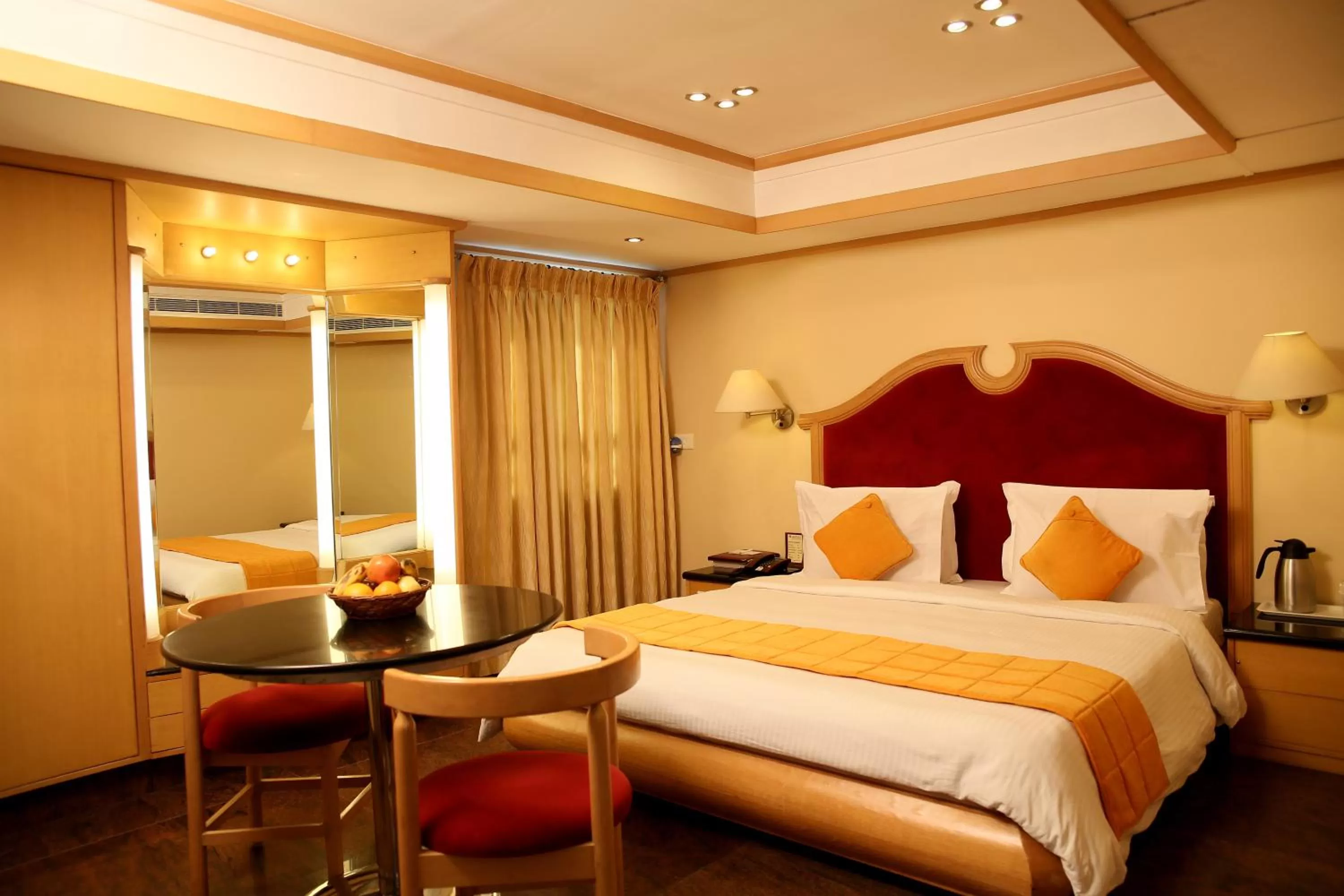 Photo of the whole room, Bed in The Madurai Residency