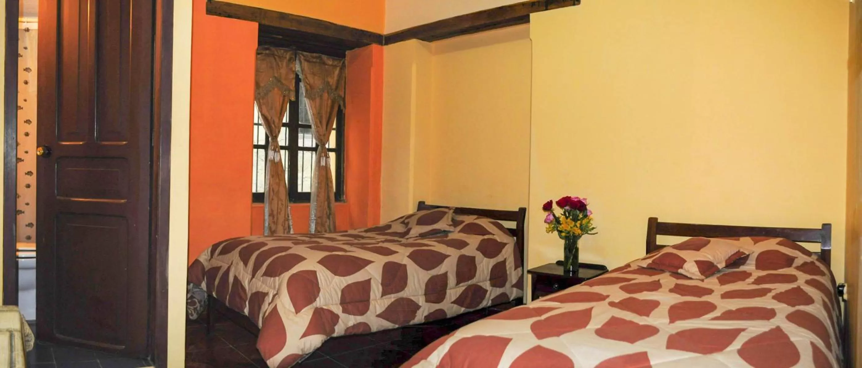 Bed in La Posada Colonial