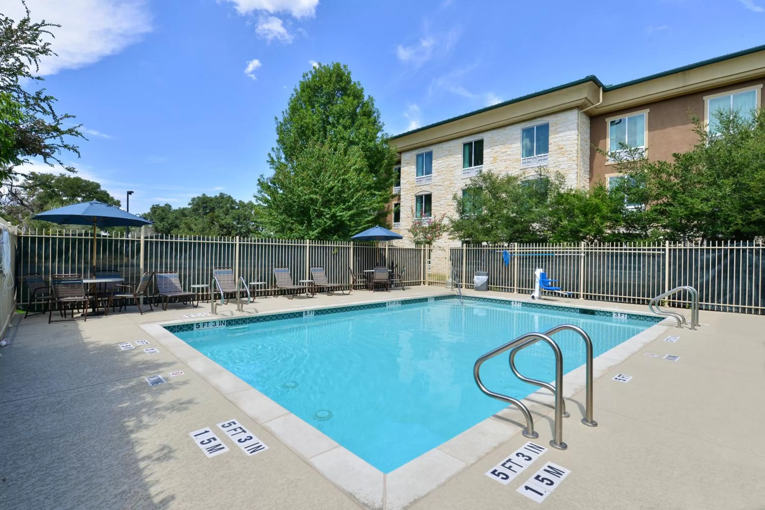 Swimming pool in Holiday Inn Express & Suites Austin SW - Sunset Valley by IHG Hotel
