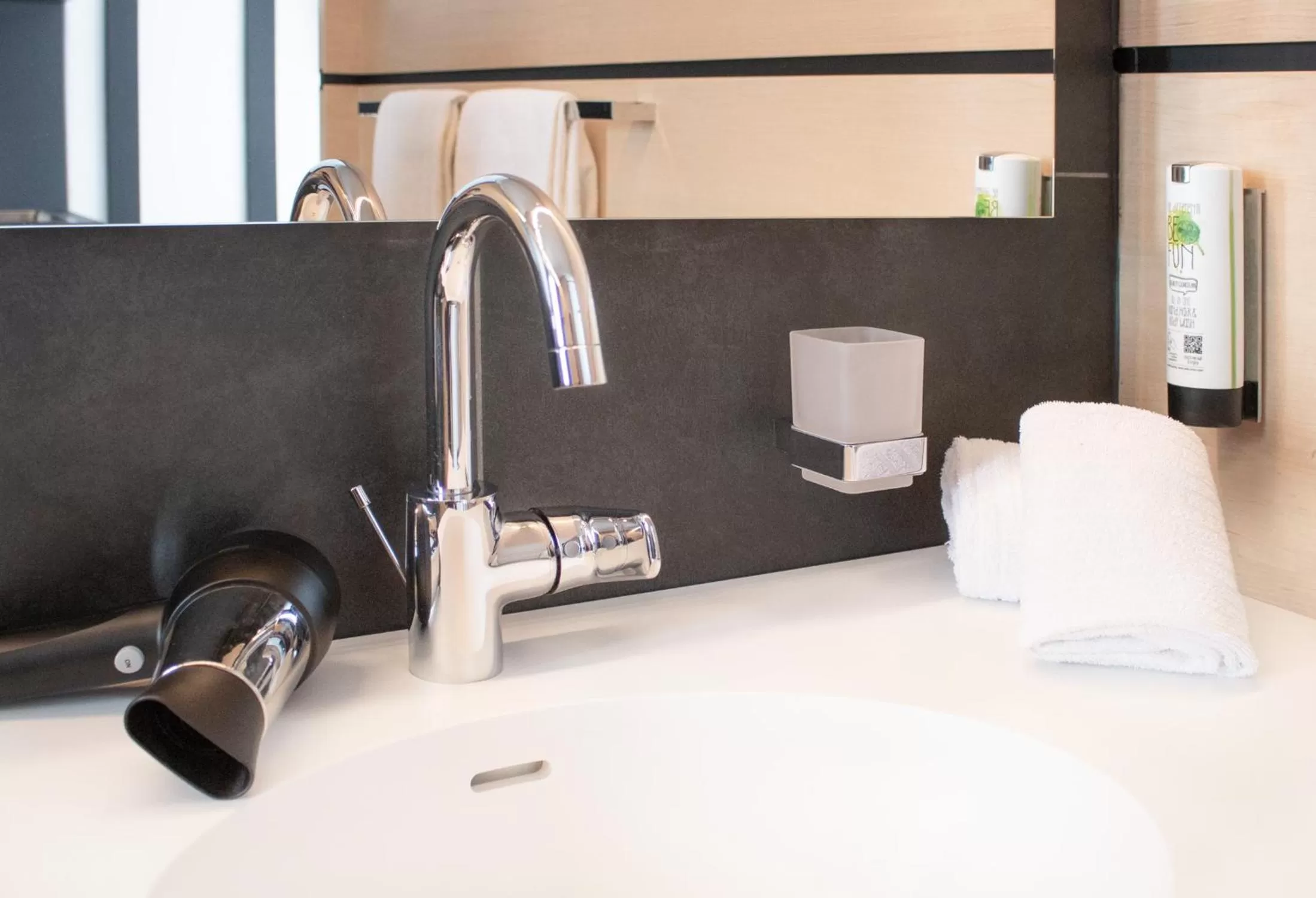 Bathroom in GA Hotel by WMM Hotels