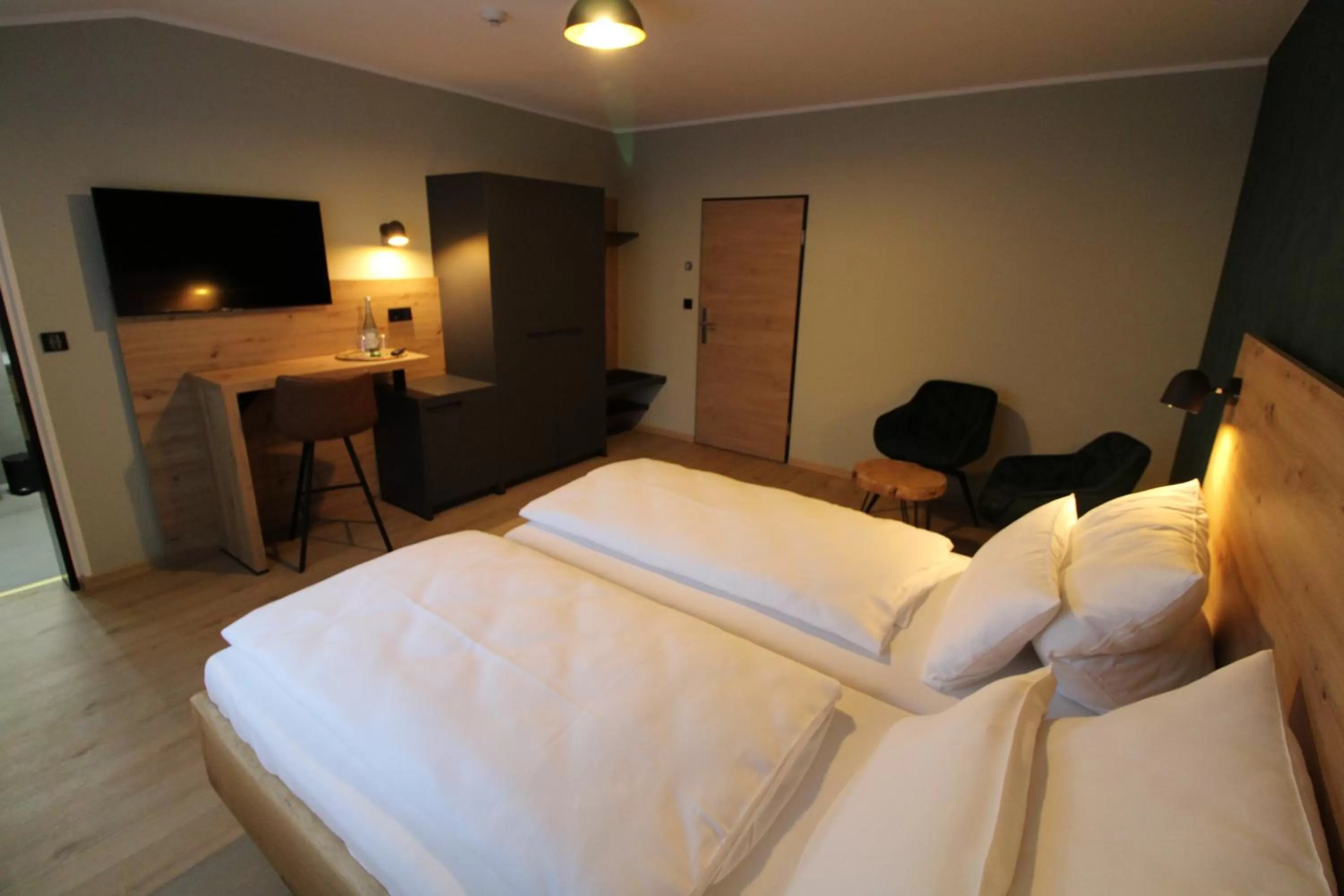 Bed in DER Hirsch Hotel