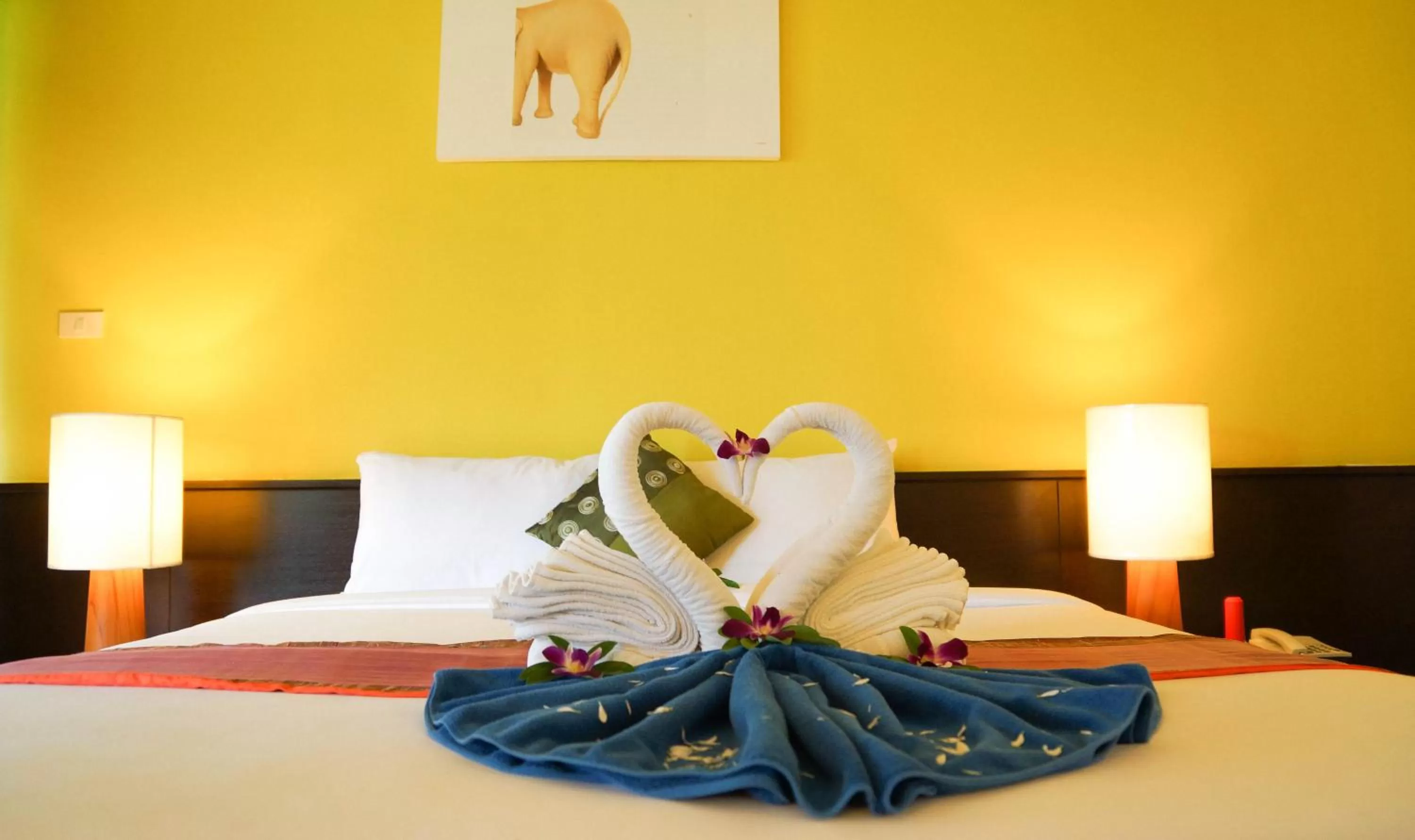 Bed in Palm Galleria Resort