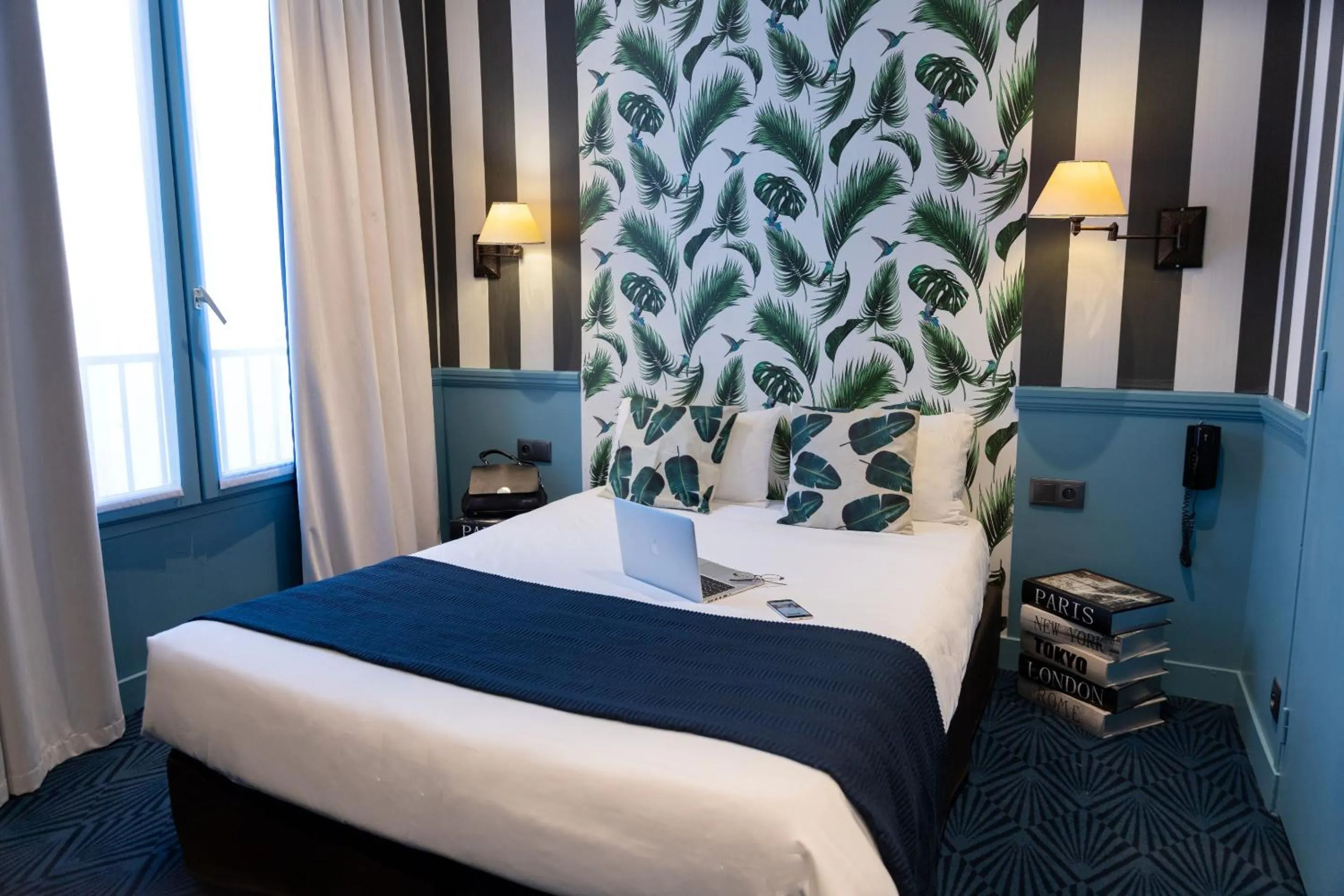 Bed in Hôtel du Théâtre by Patrick Hayat