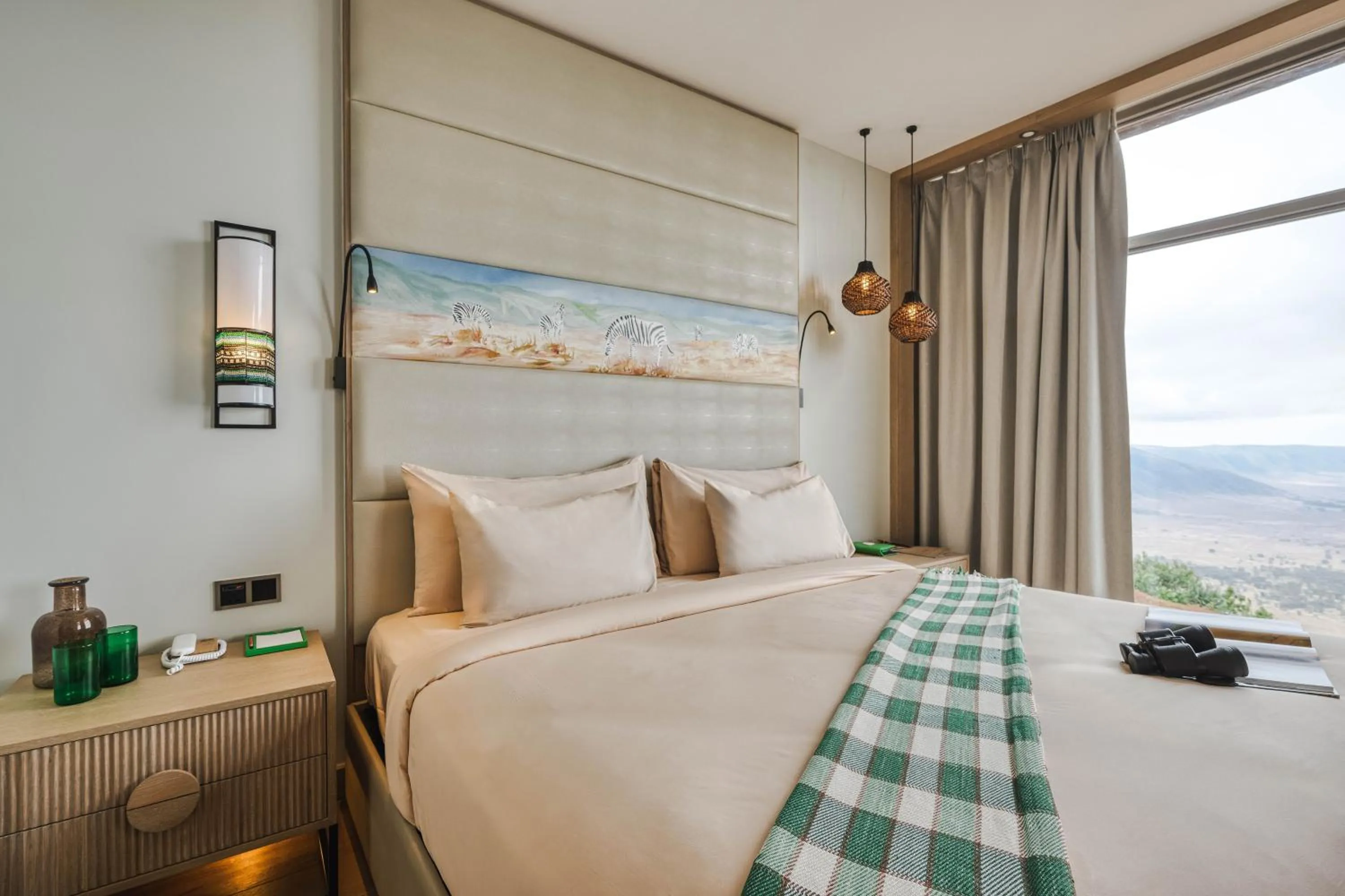 Bed in Ngorongoro Lodge member of Melia Collection - The Leading Hotels of the World