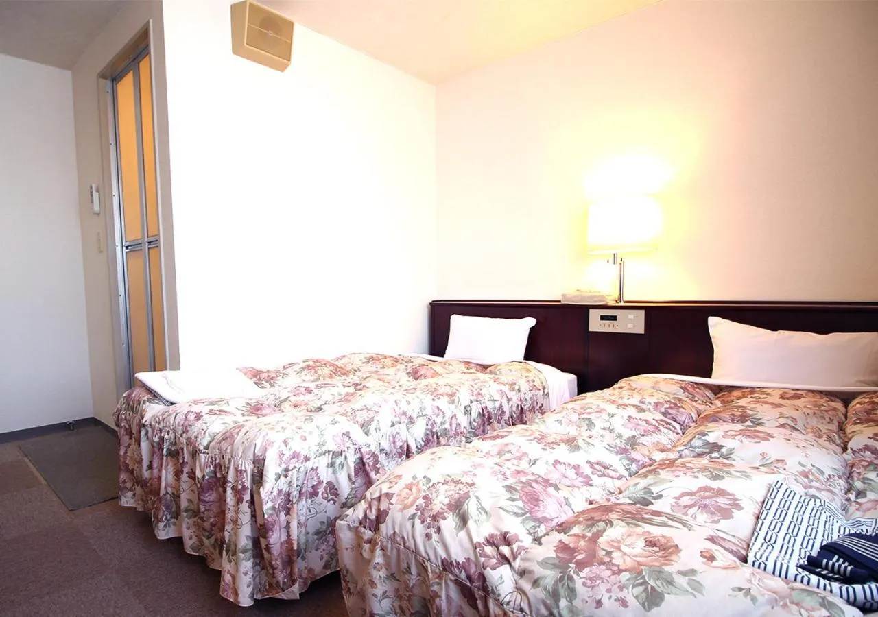 Bed in Royal Inn Shinyamaguchi Ekimae