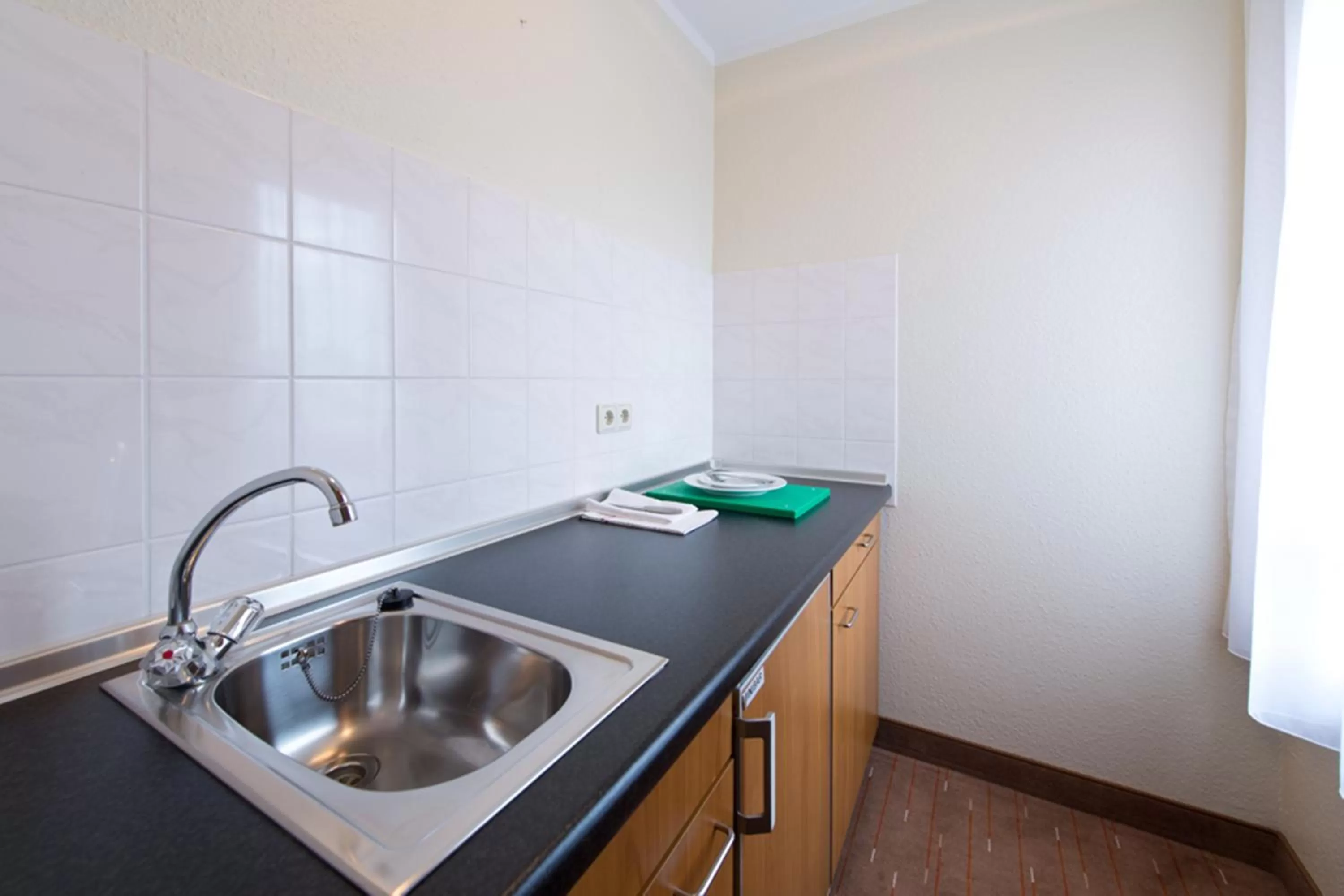 Kitchen or kitchenette in ACHAT Hotel Schwarzheide Lausitz