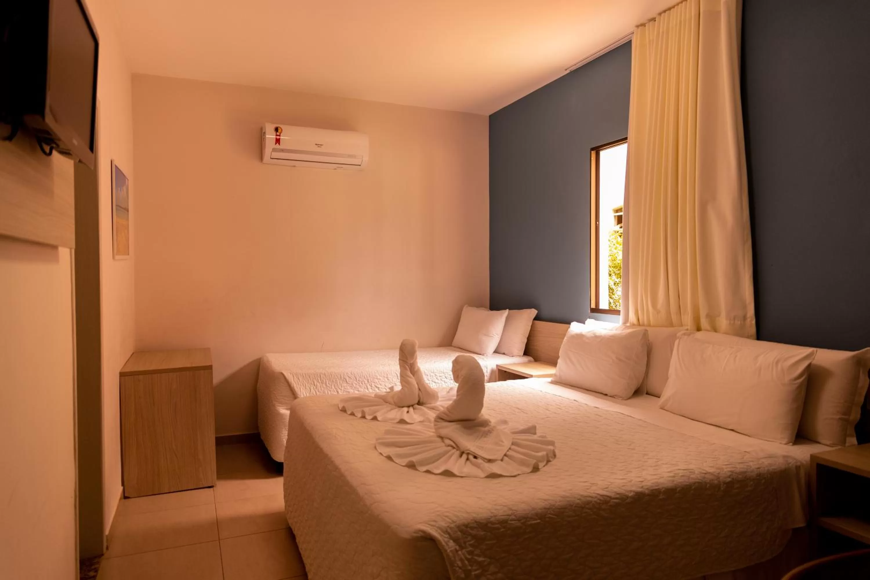 Bed in Pousada Mariluz