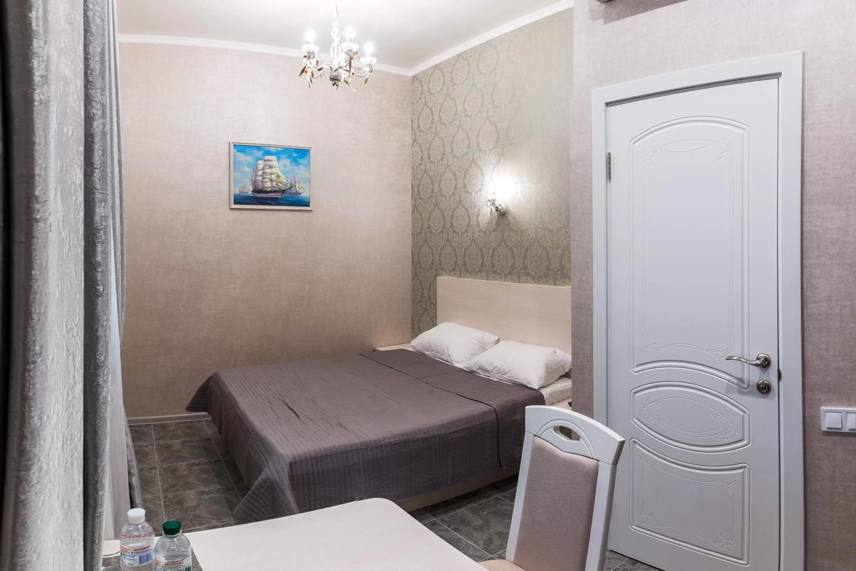 Bed in L.O.Y Family Hotel