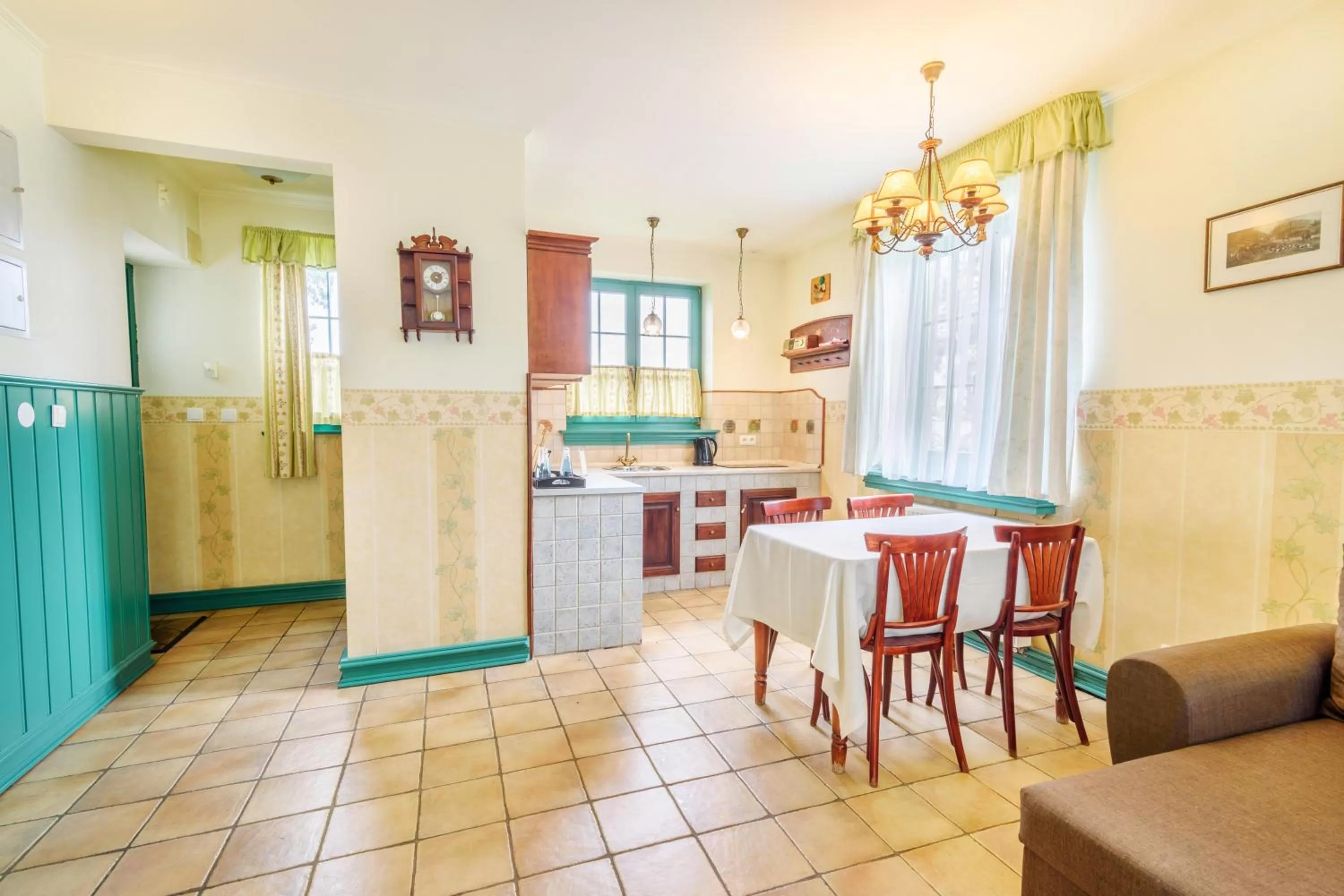 Kitchen or kitchenette in Amax Boutique Hotel