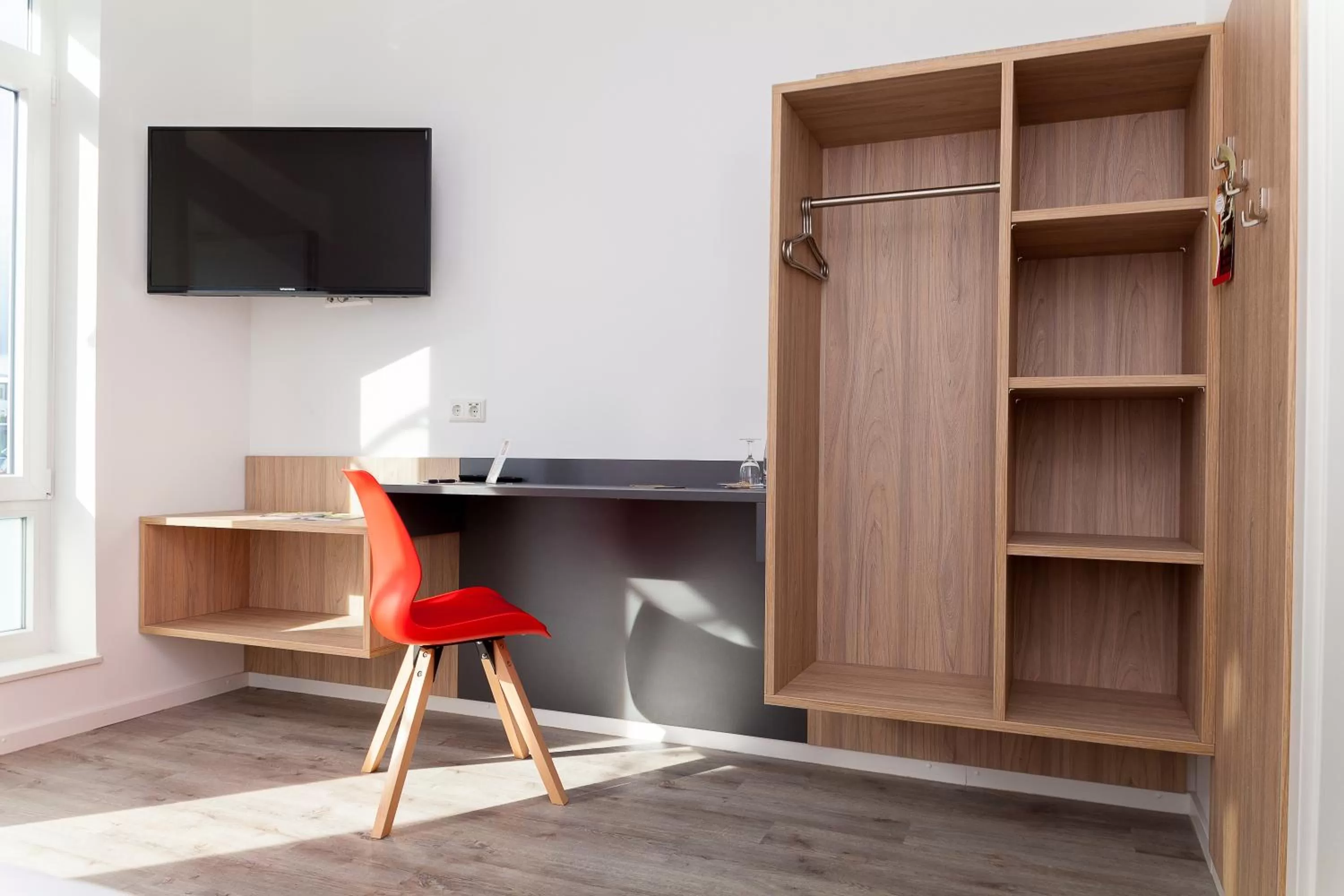 wardrobe, TV/Entertainment Center in Hotel Hohenloher Tor