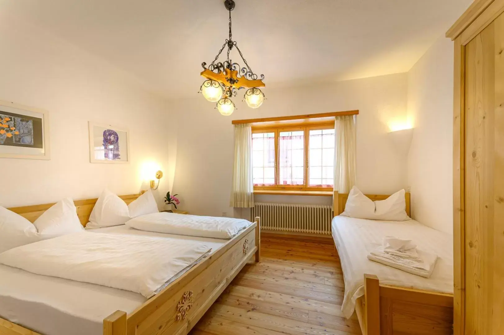 Classic Triple Room in Hotel Centrale, Typically Swiss Classic Triple Room in Hotel Centrale, Typically Swiss