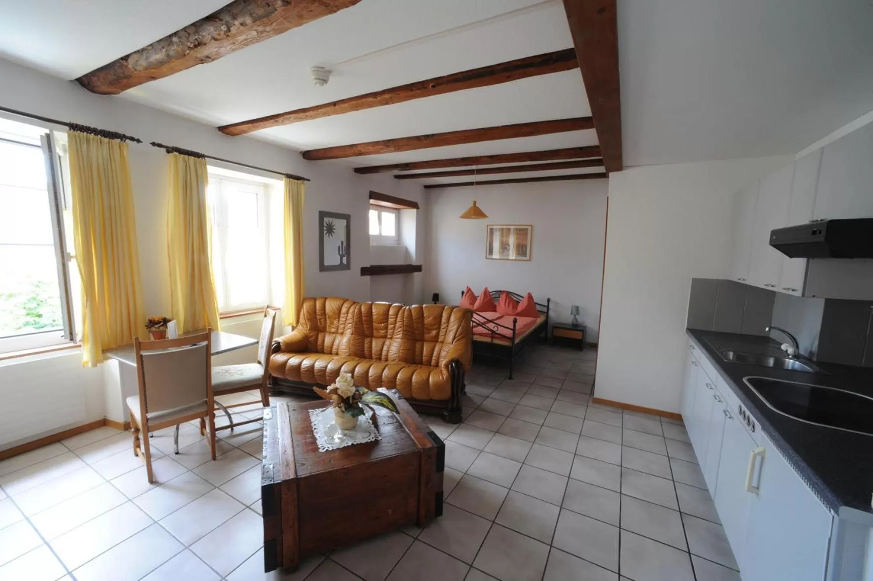 Bed in Chez Gilles hôtel resto bar SA