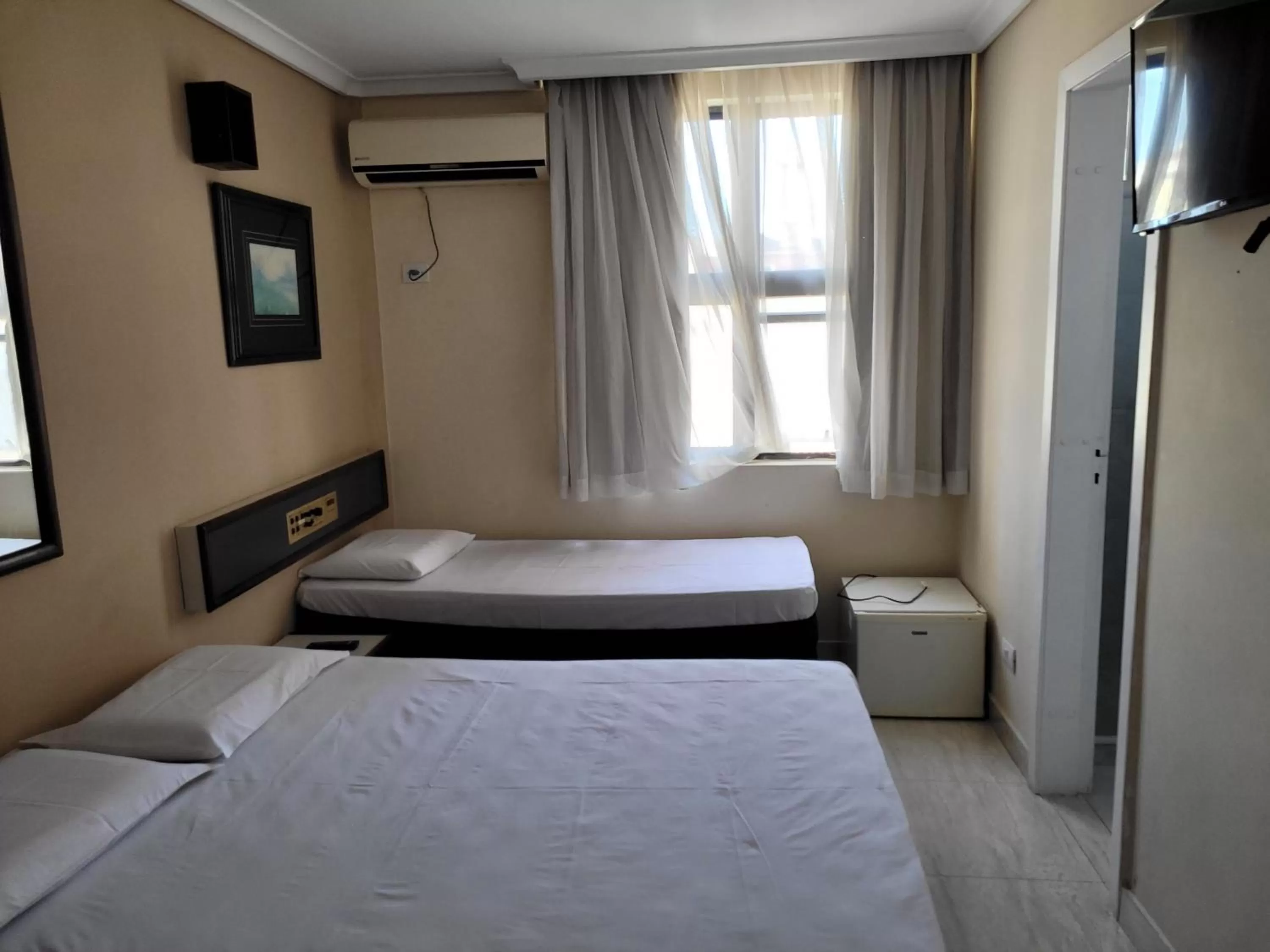 Bed in Hotel Estação Express