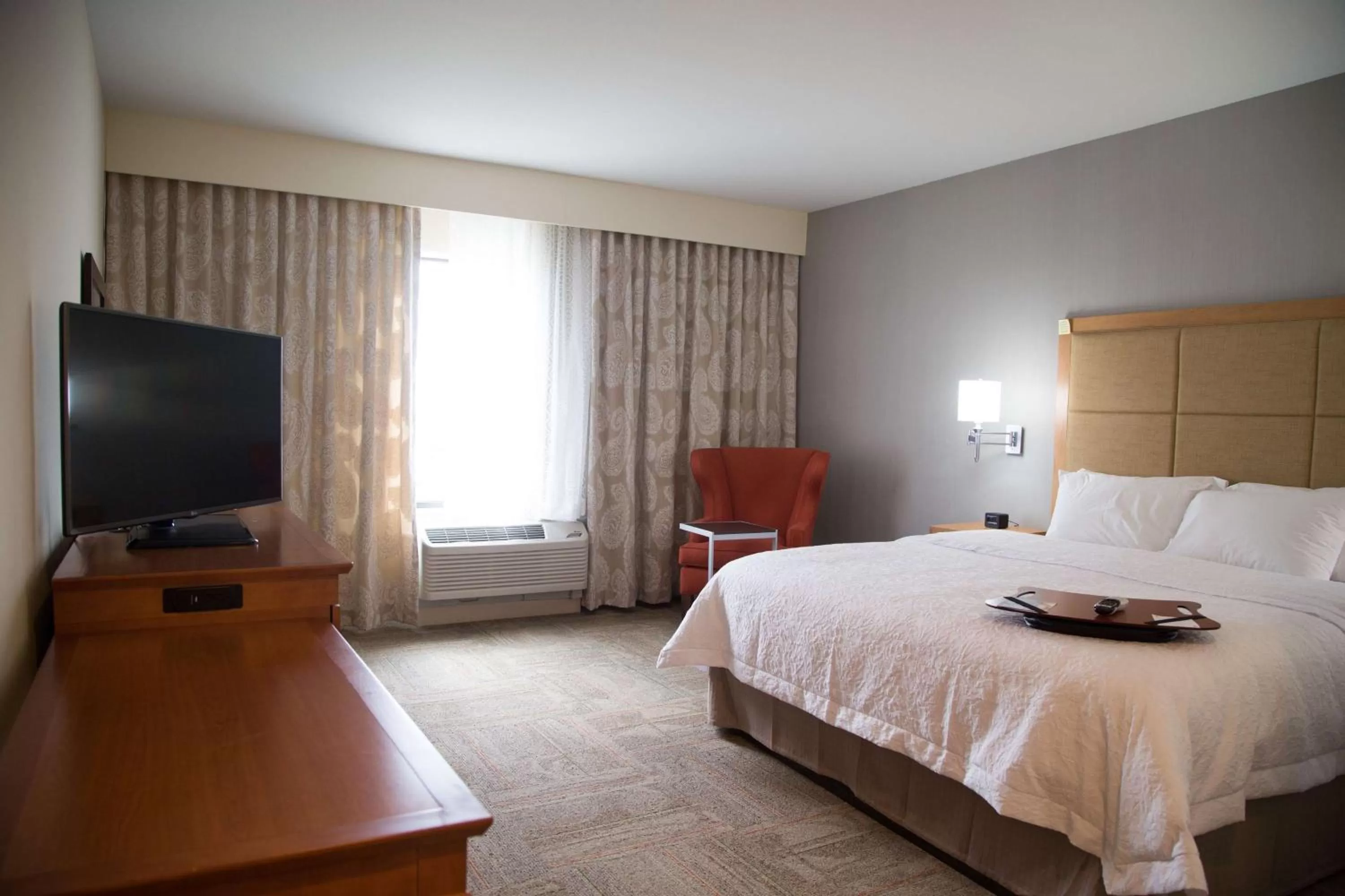 Bed in Hampton Inn and Suites by Hilton McKinney