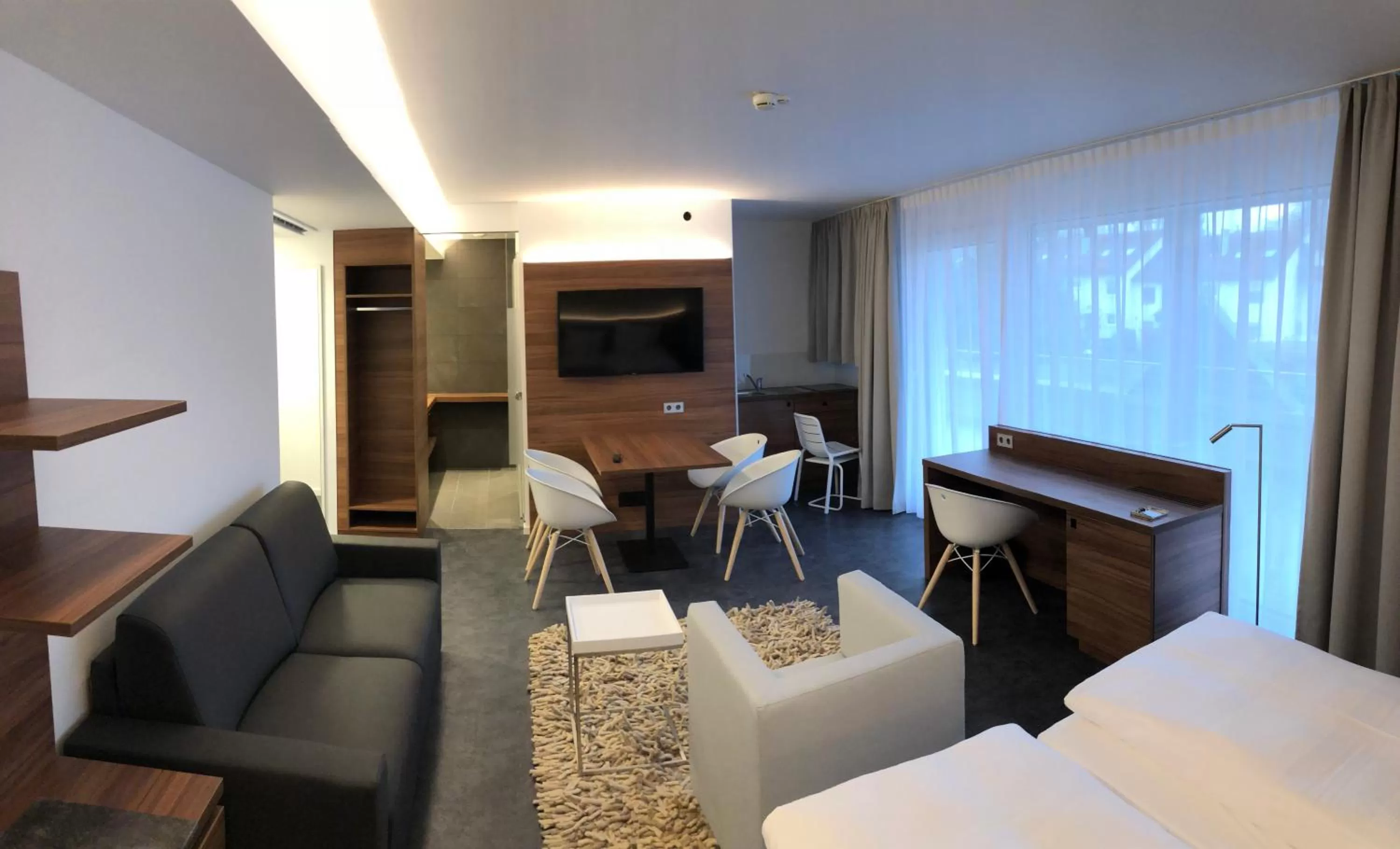 Living room, Bed in Fairotel