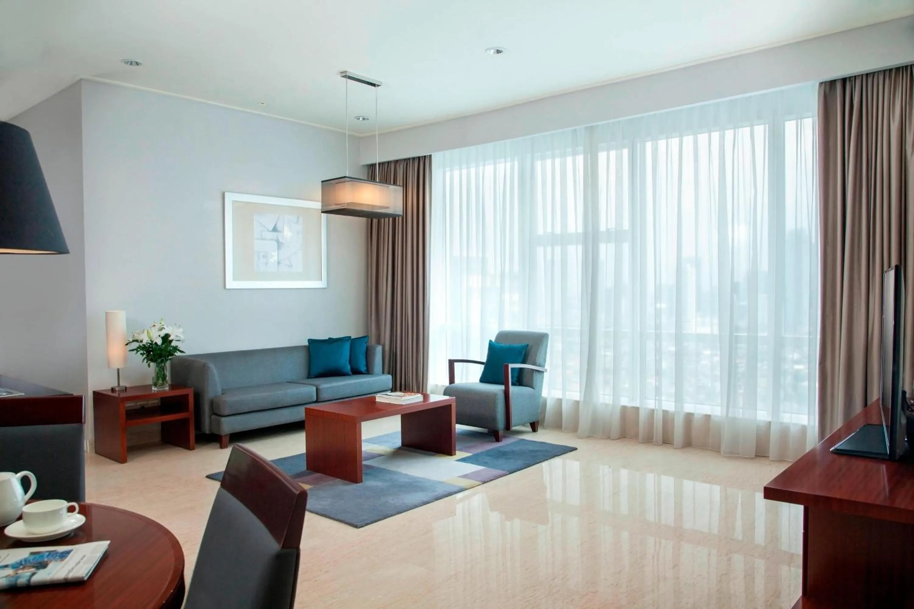 Living room in The Mayflower, Jakarta-Marriott Executive Apartments
