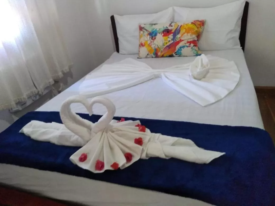 Bed in Pousada Beluga