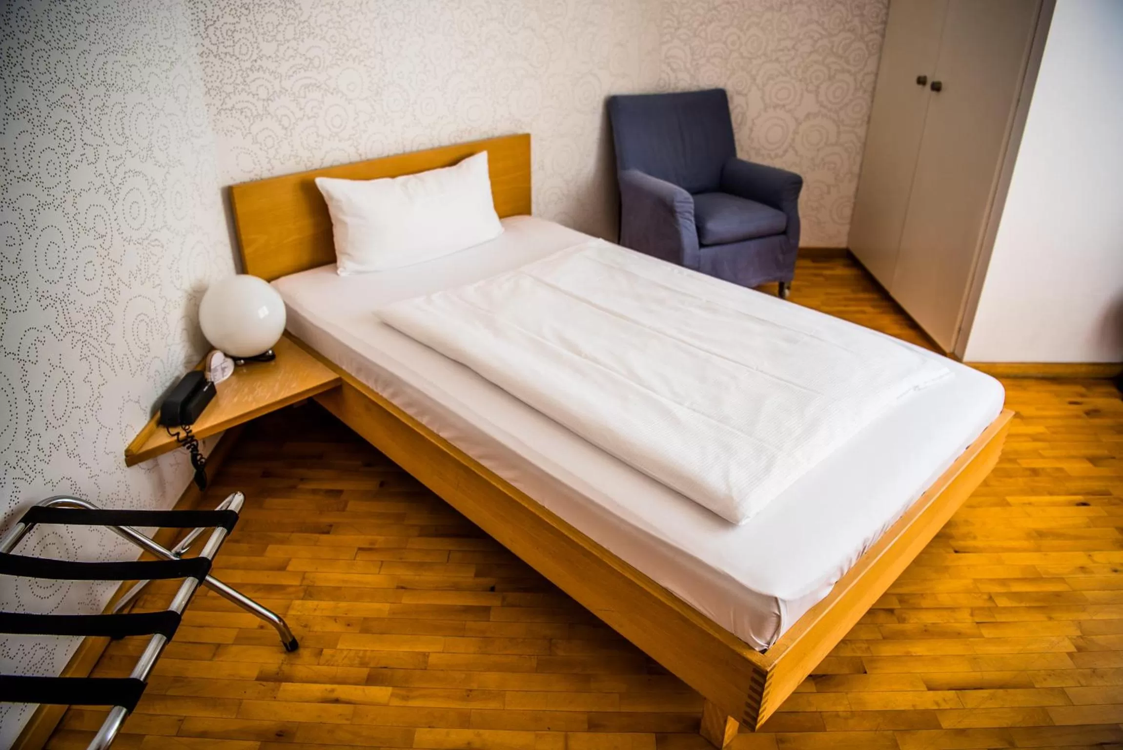 Bed in Art-Hotel Robert Mayer