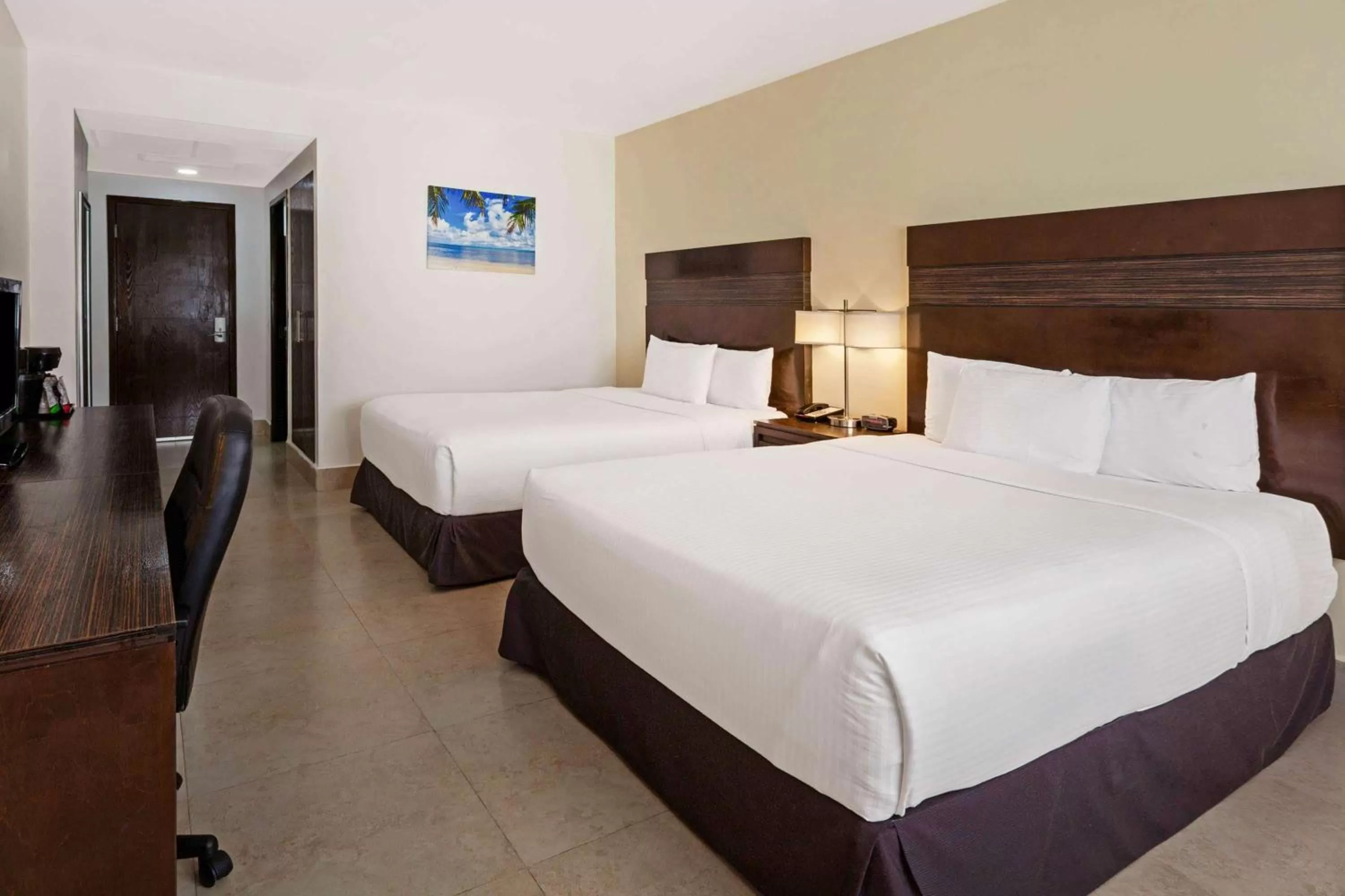 Photo of the whole room, Bed in Wyndham Garden Cancun Downtown