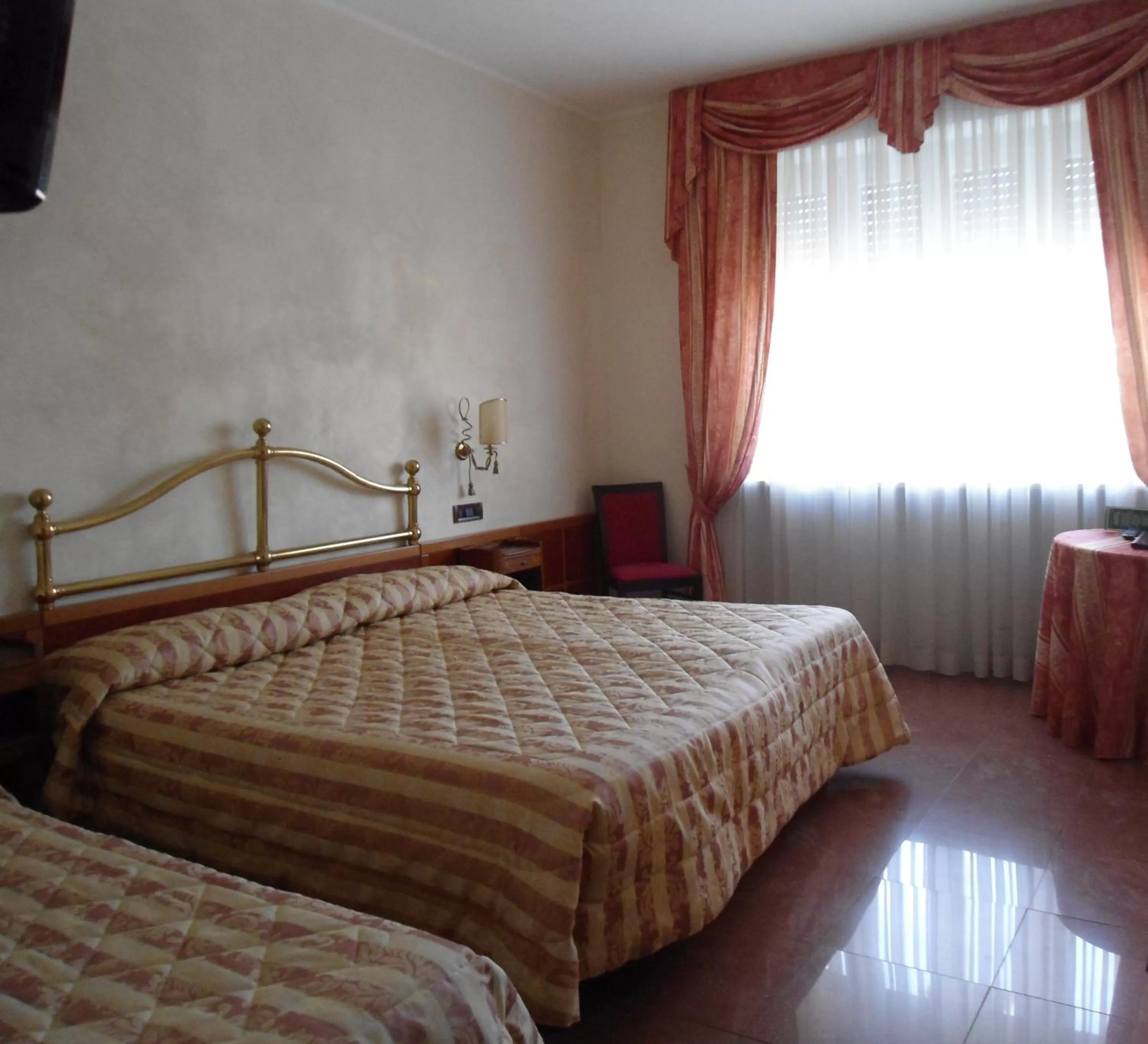 Bed in Hotel Continental