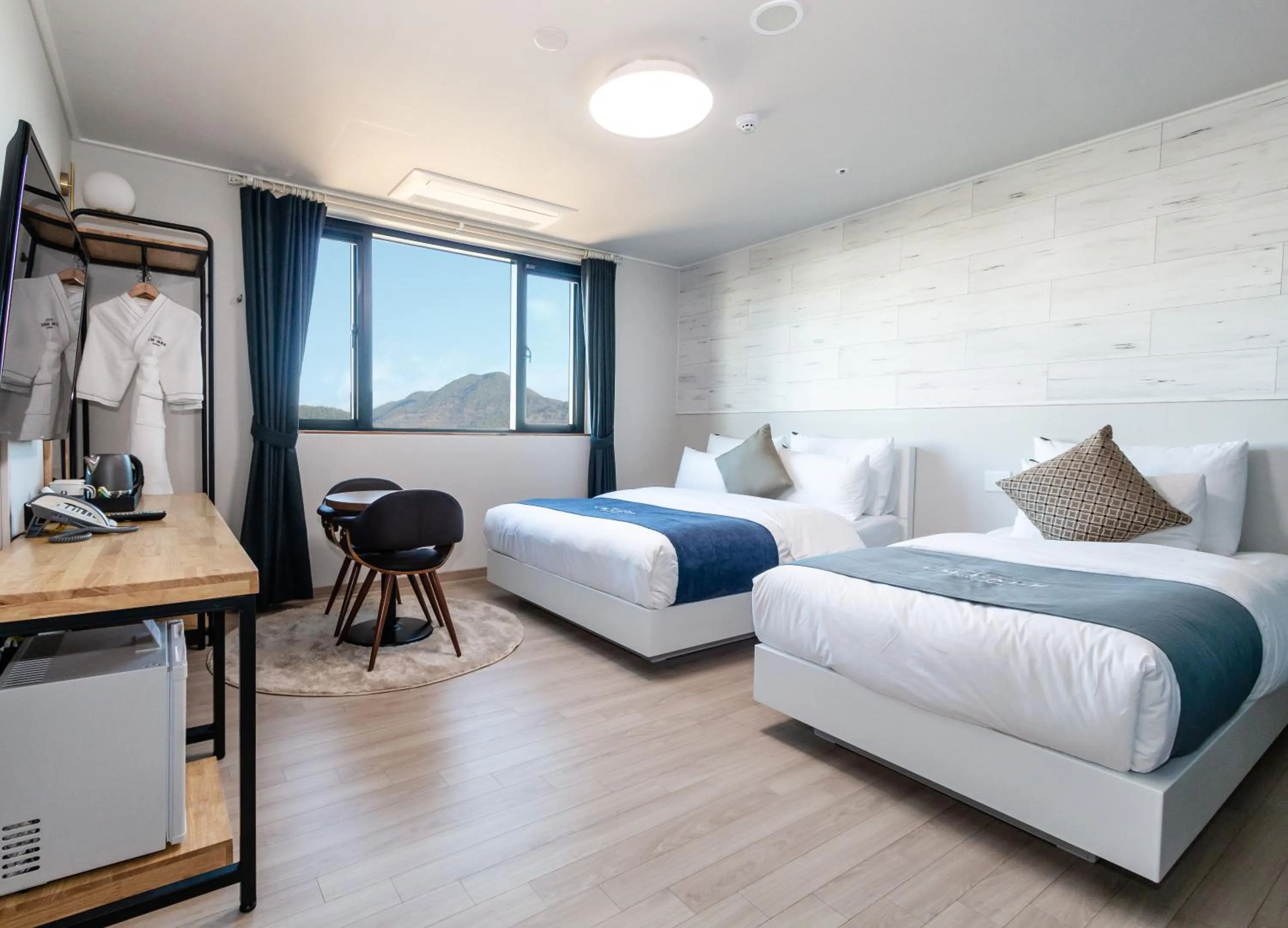 Bed in CM Park Hotel