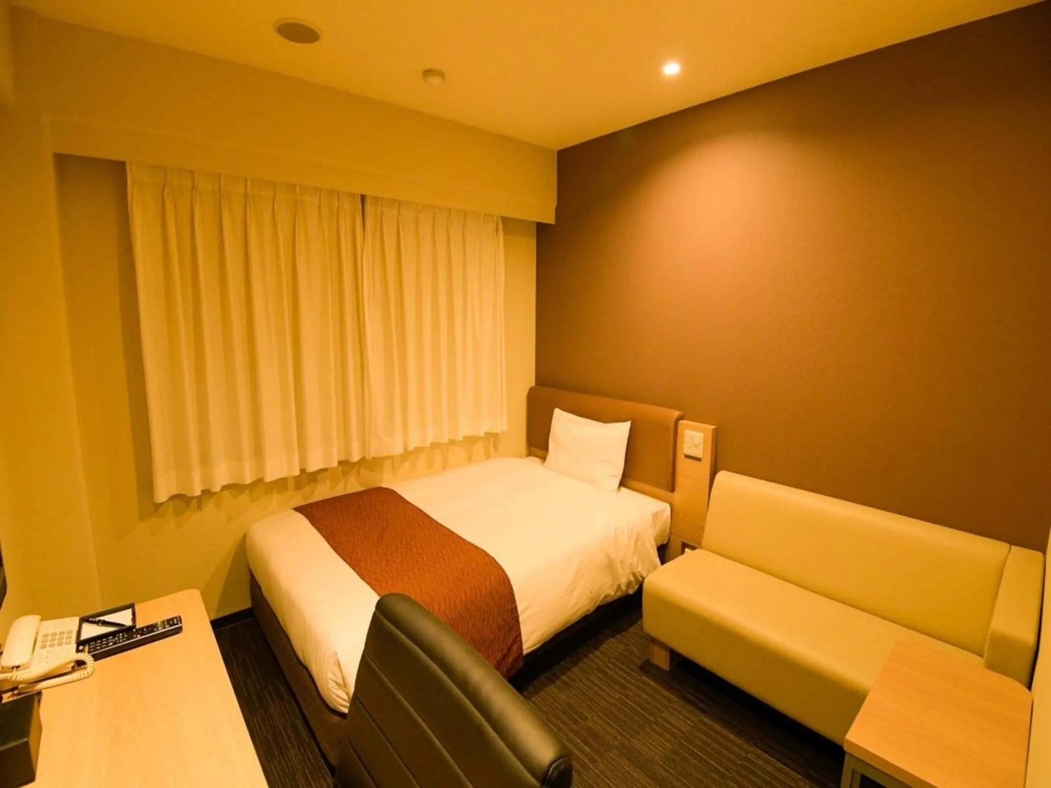 Bed in Via Inn Shin Osaka West