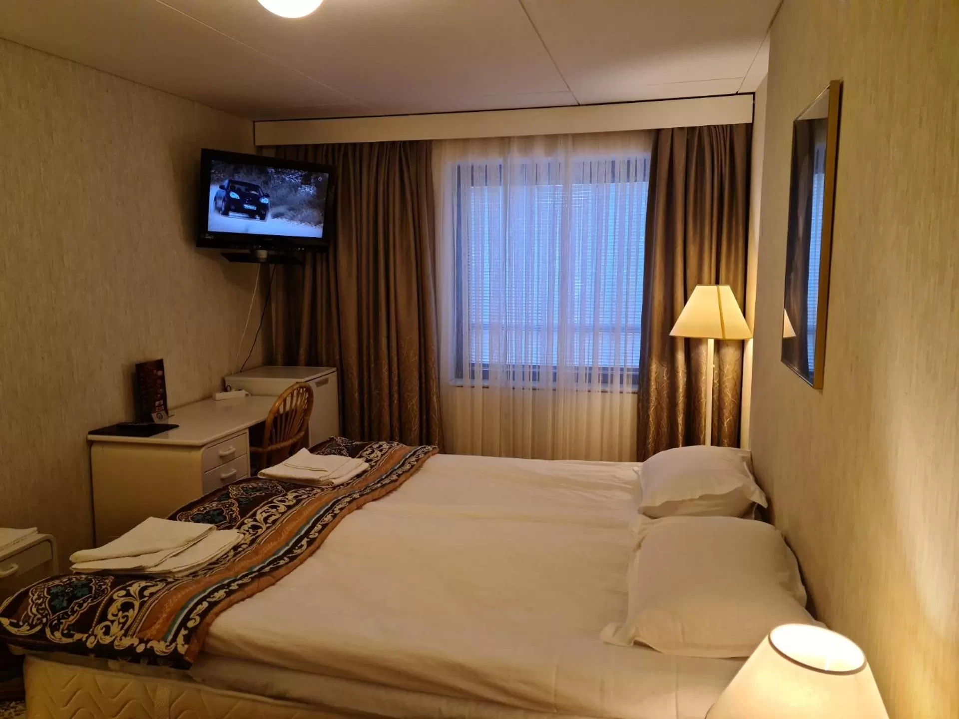 Bed in Hotelli Sandels