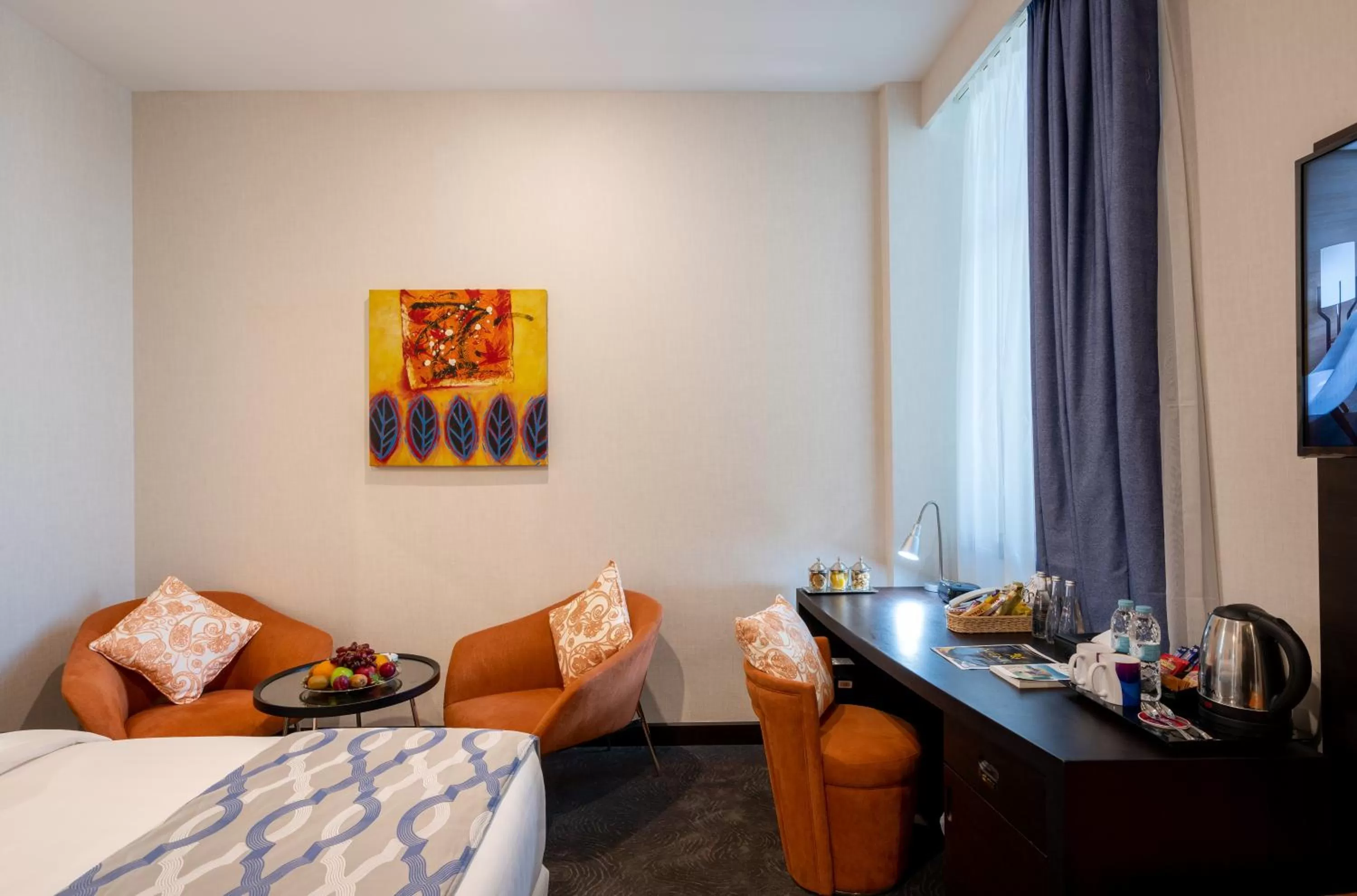 Photo of the whole room, Bed in Ramada Encore Doha by Wyndham