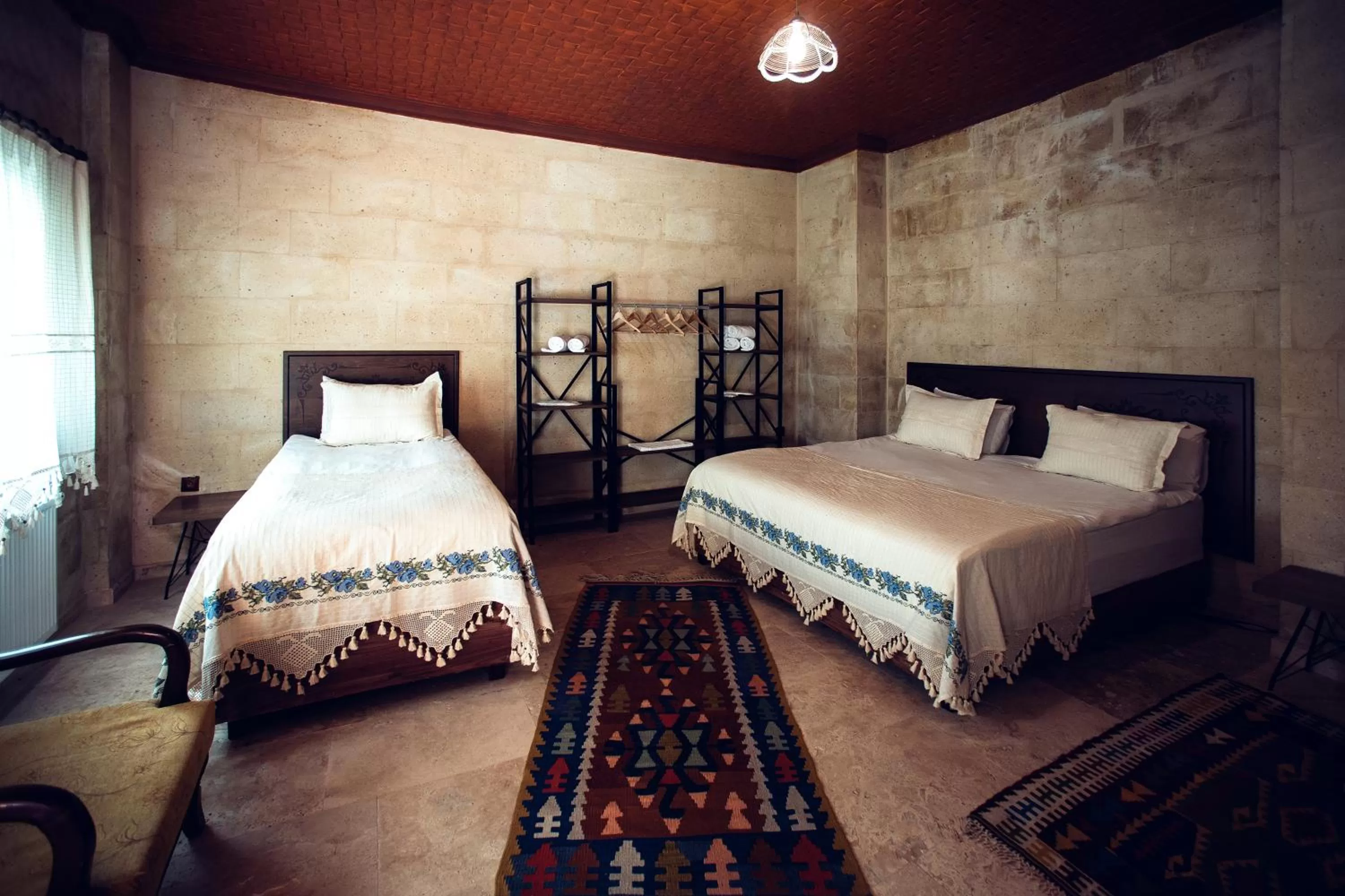 Bed in Azalea Terrace Cave Hotel