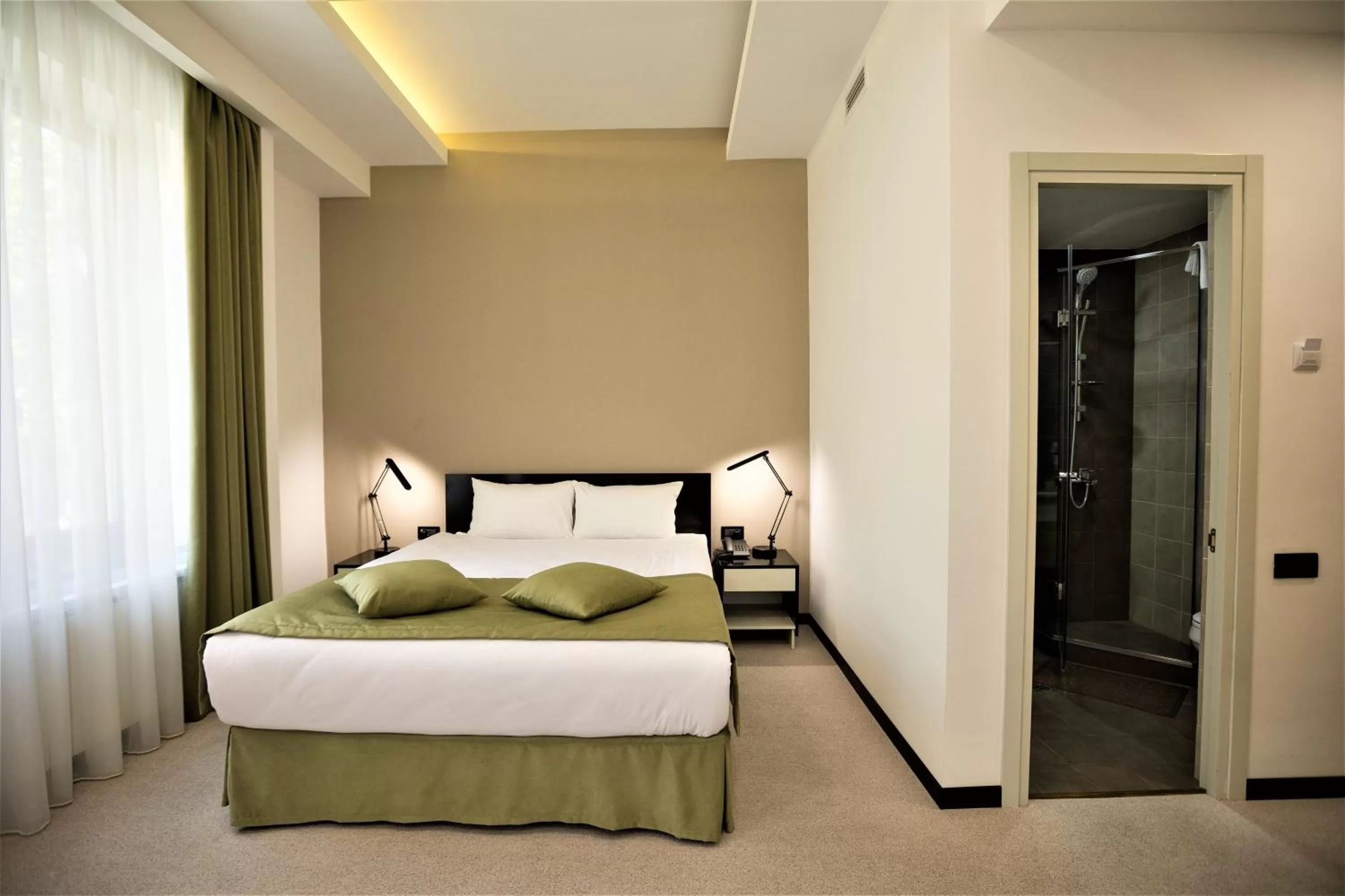 Bed in AnnaBella Boutique Hotel