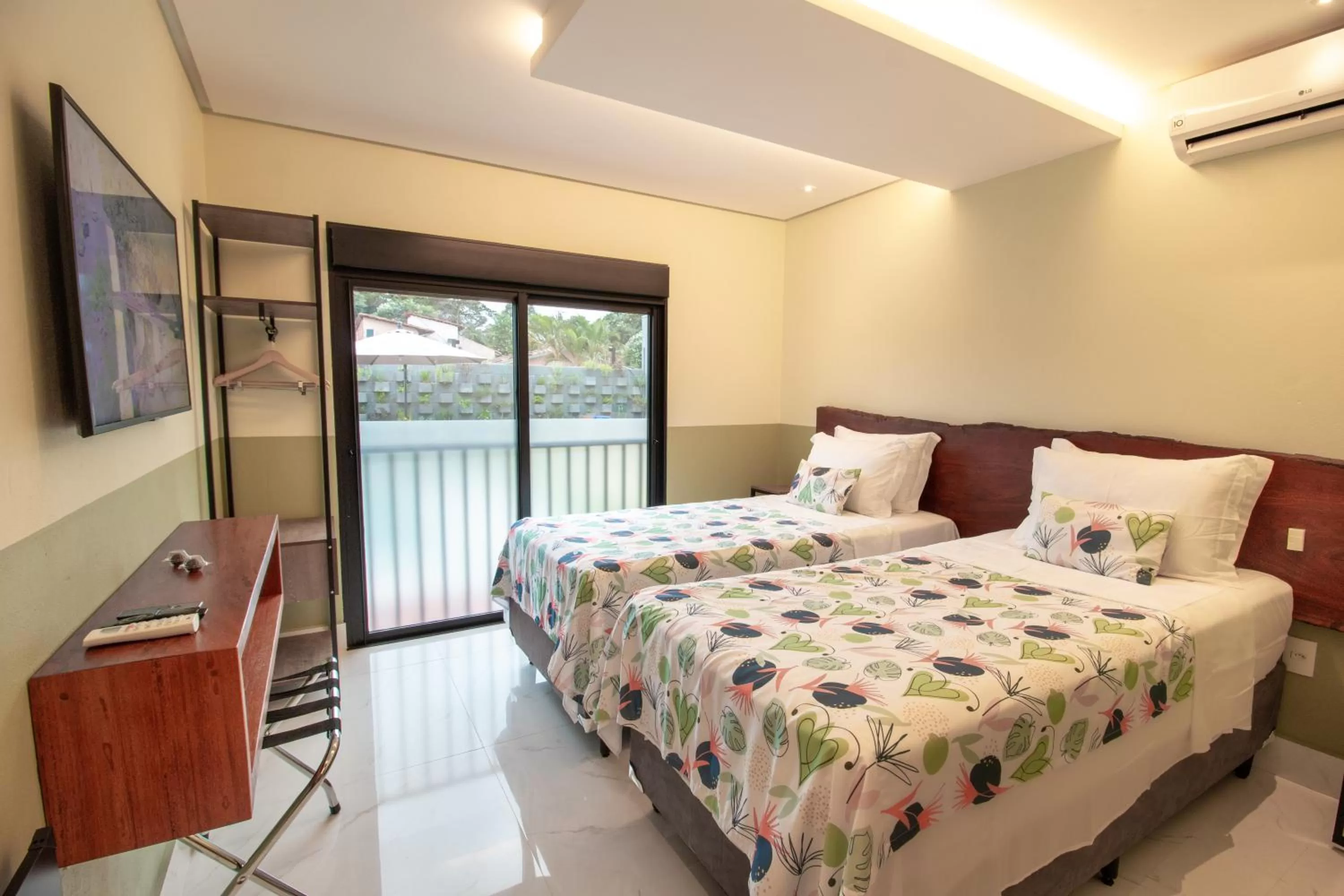 Bed in Pousada Flores do Carmo