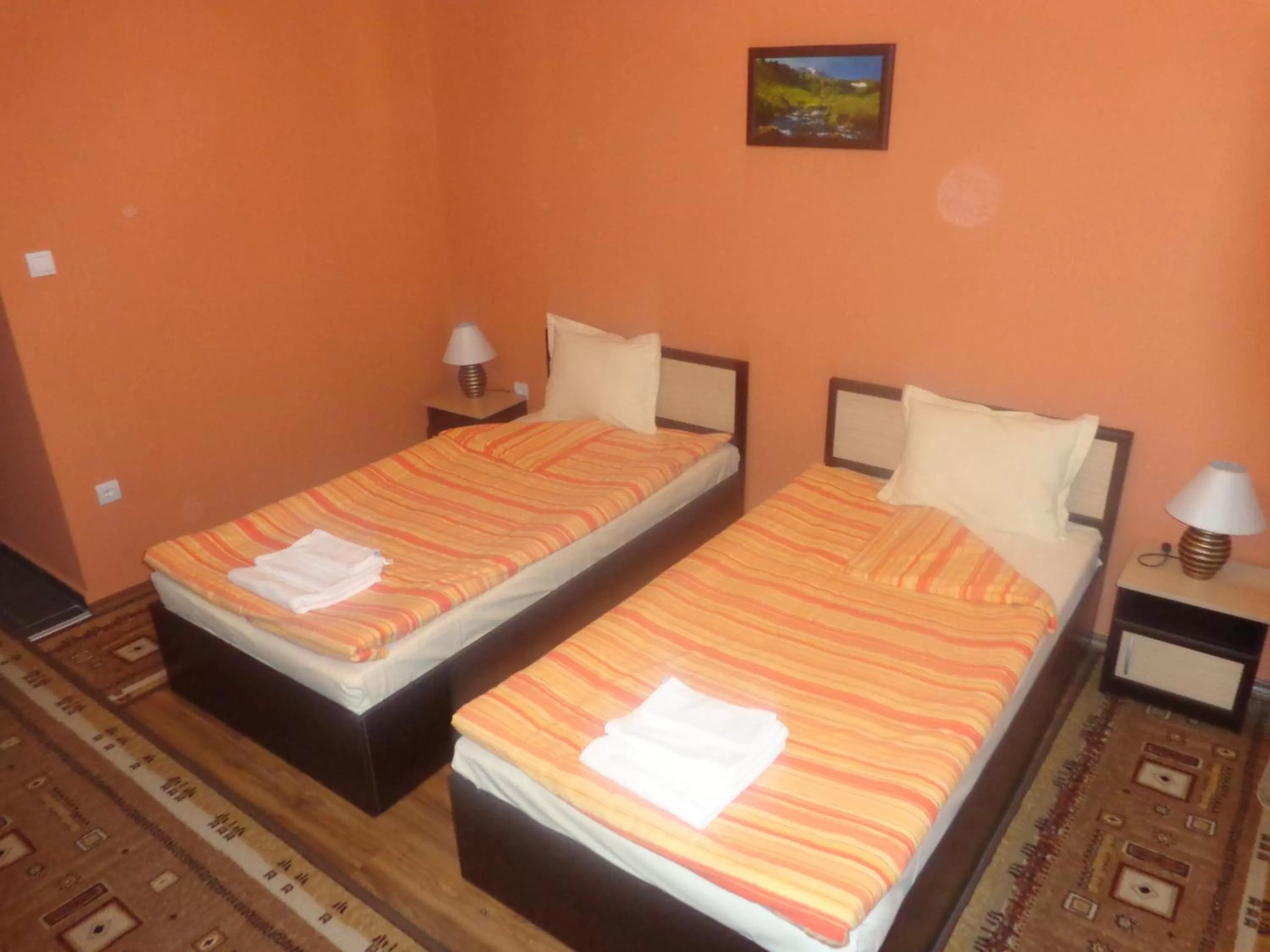 Bed in Kestenite Family Hotel