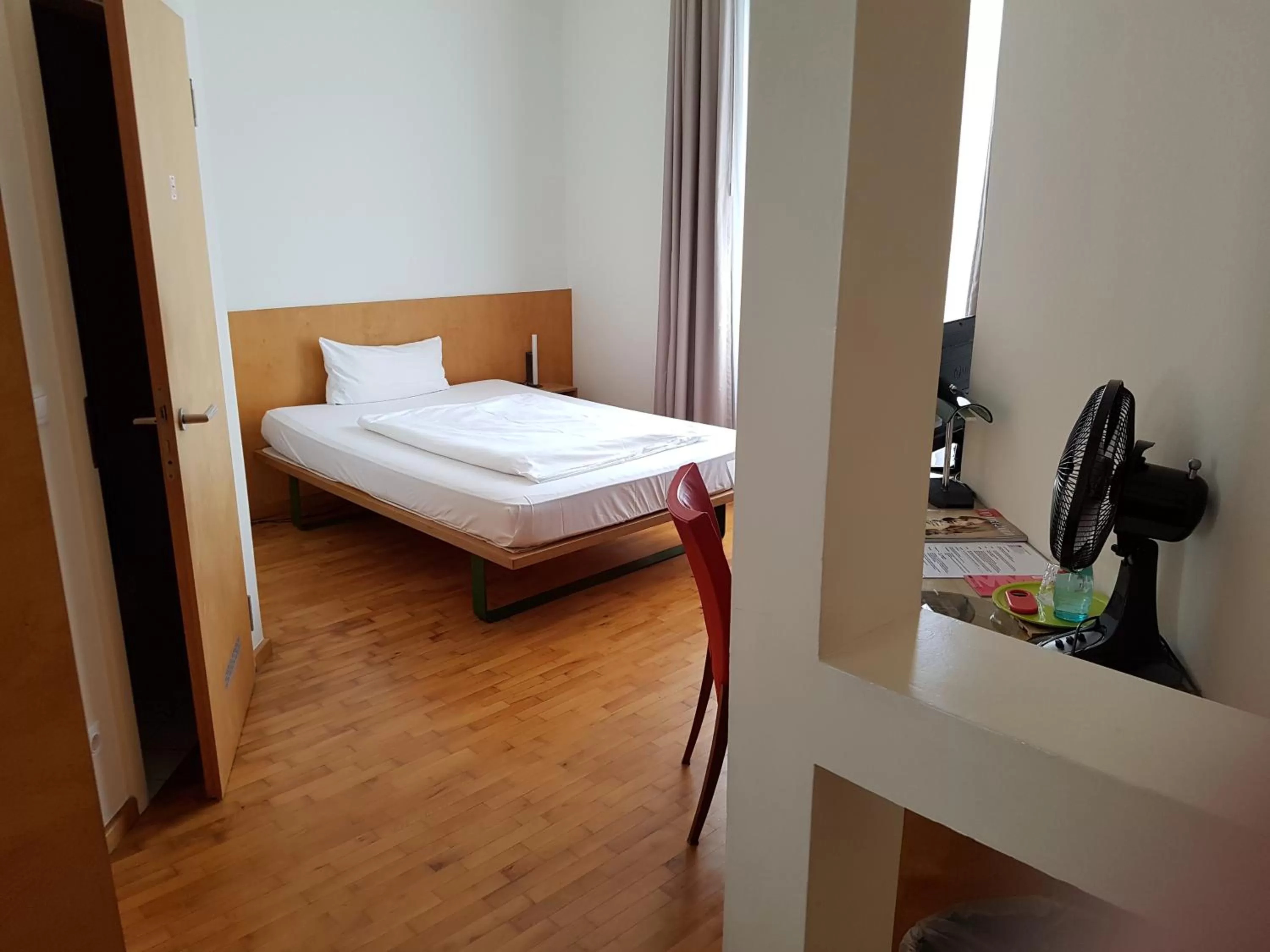 Bed in Art-Hotel Robert Mayer