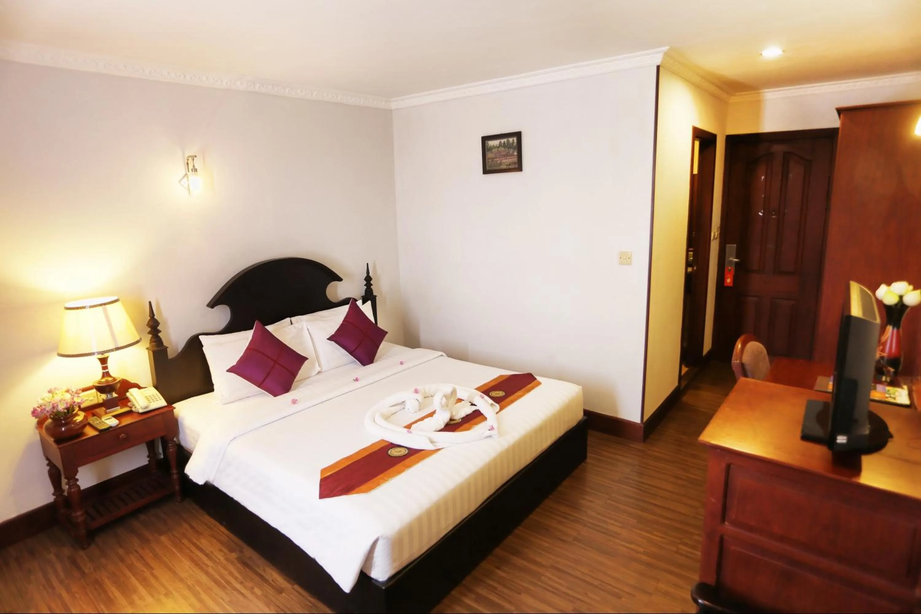 Bed in Lucky Angkor Hotel & Spa