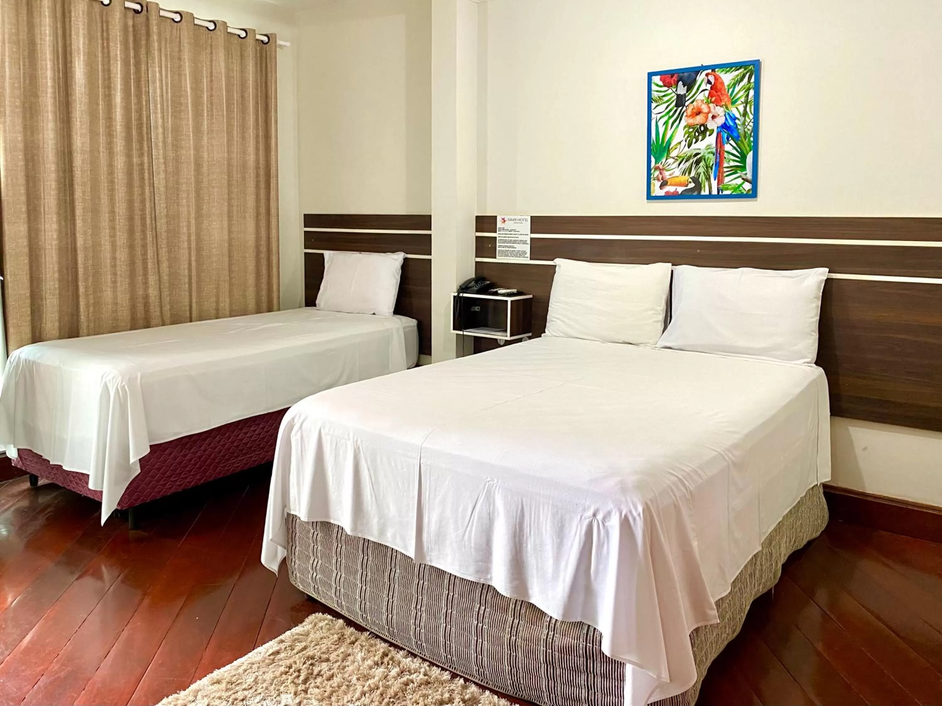 Bed in SAMIR HOTEL COMFORT