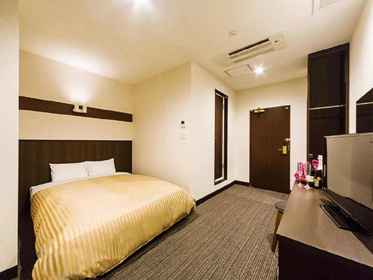 Bed in Hotel CASVI Tenjin