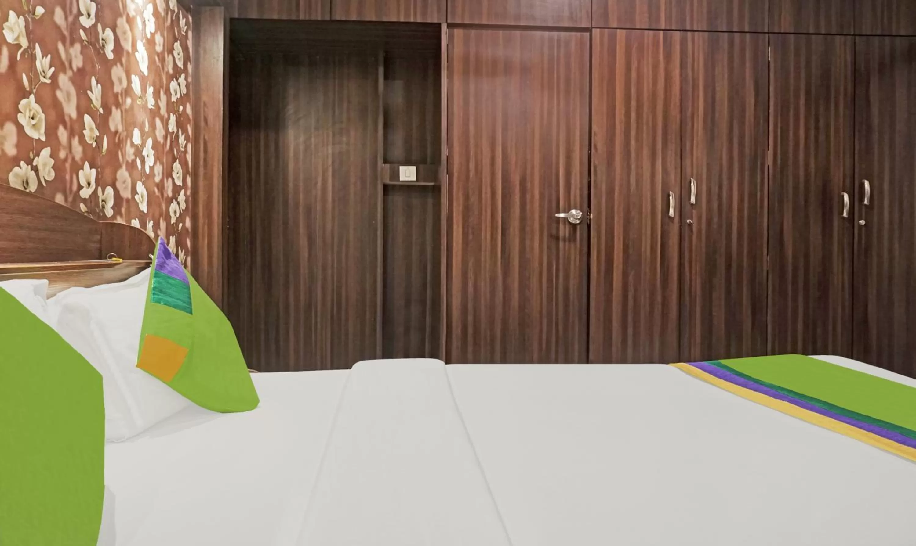 Bedroom, Bed in Treebo Excellent Home