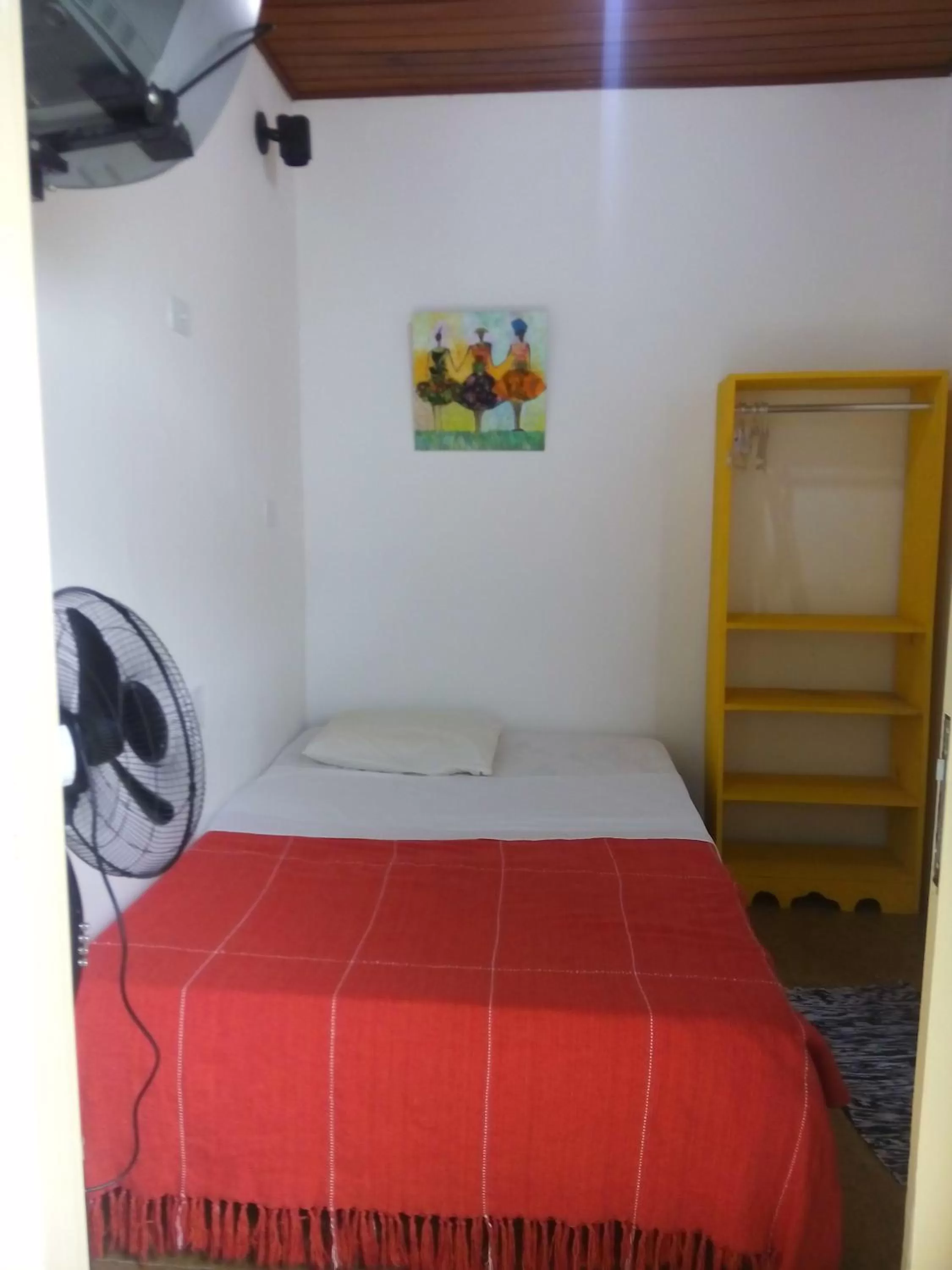 Photo of the whole room, Bed in Suítes o Flautista