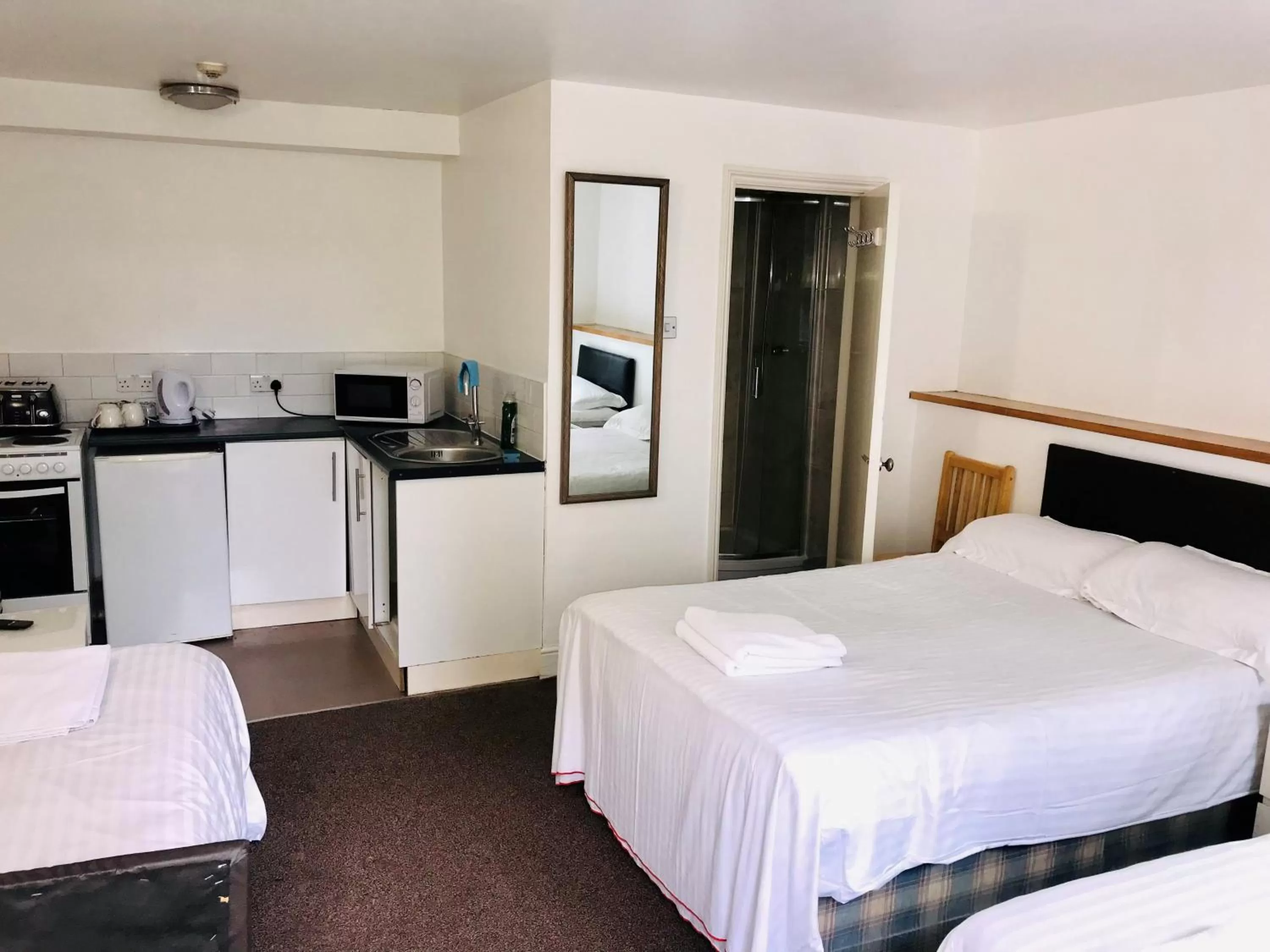 Bed in Amhurst Hotel