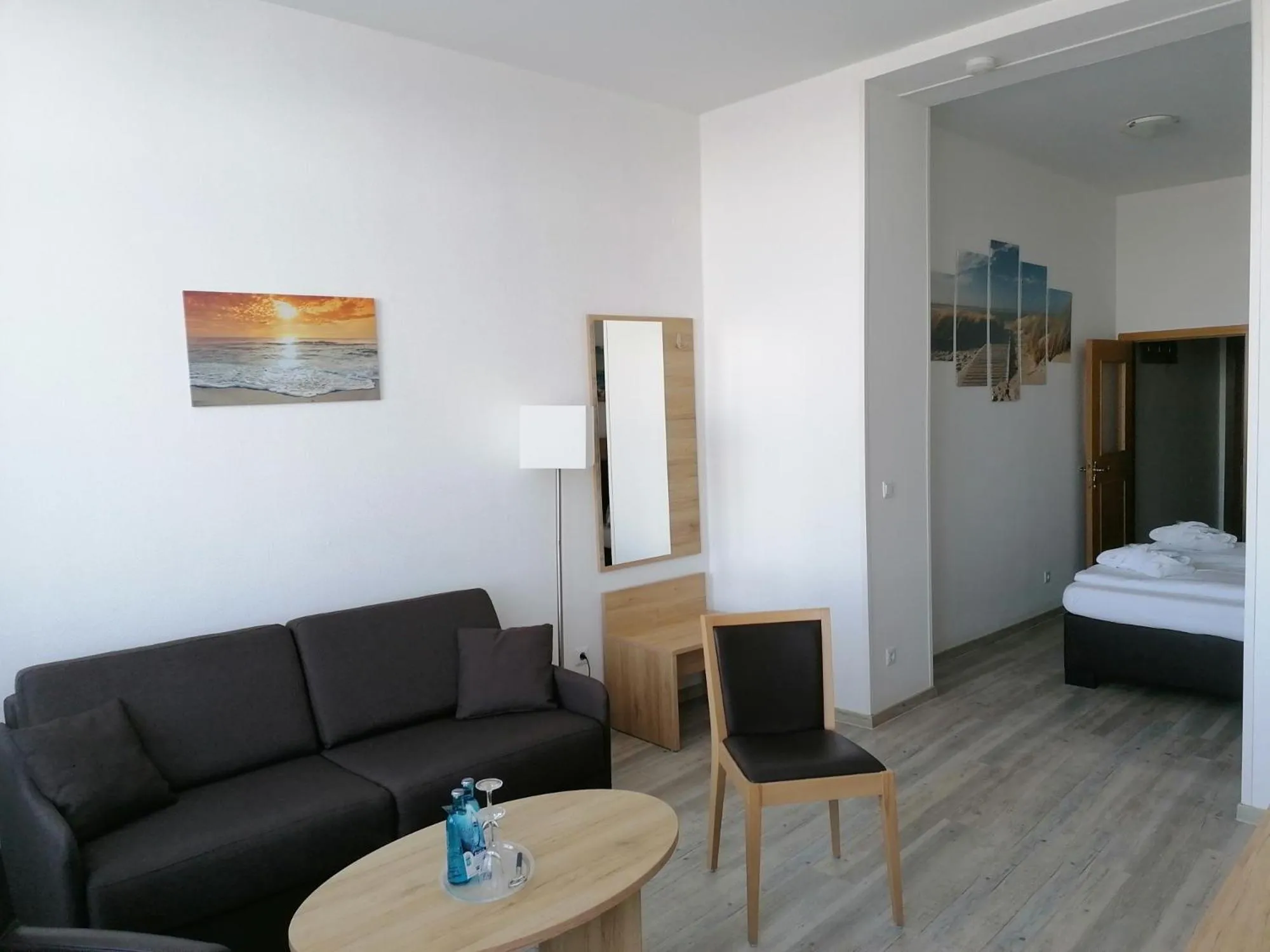 Living room, Bed in Nordsee Hotel Borkum