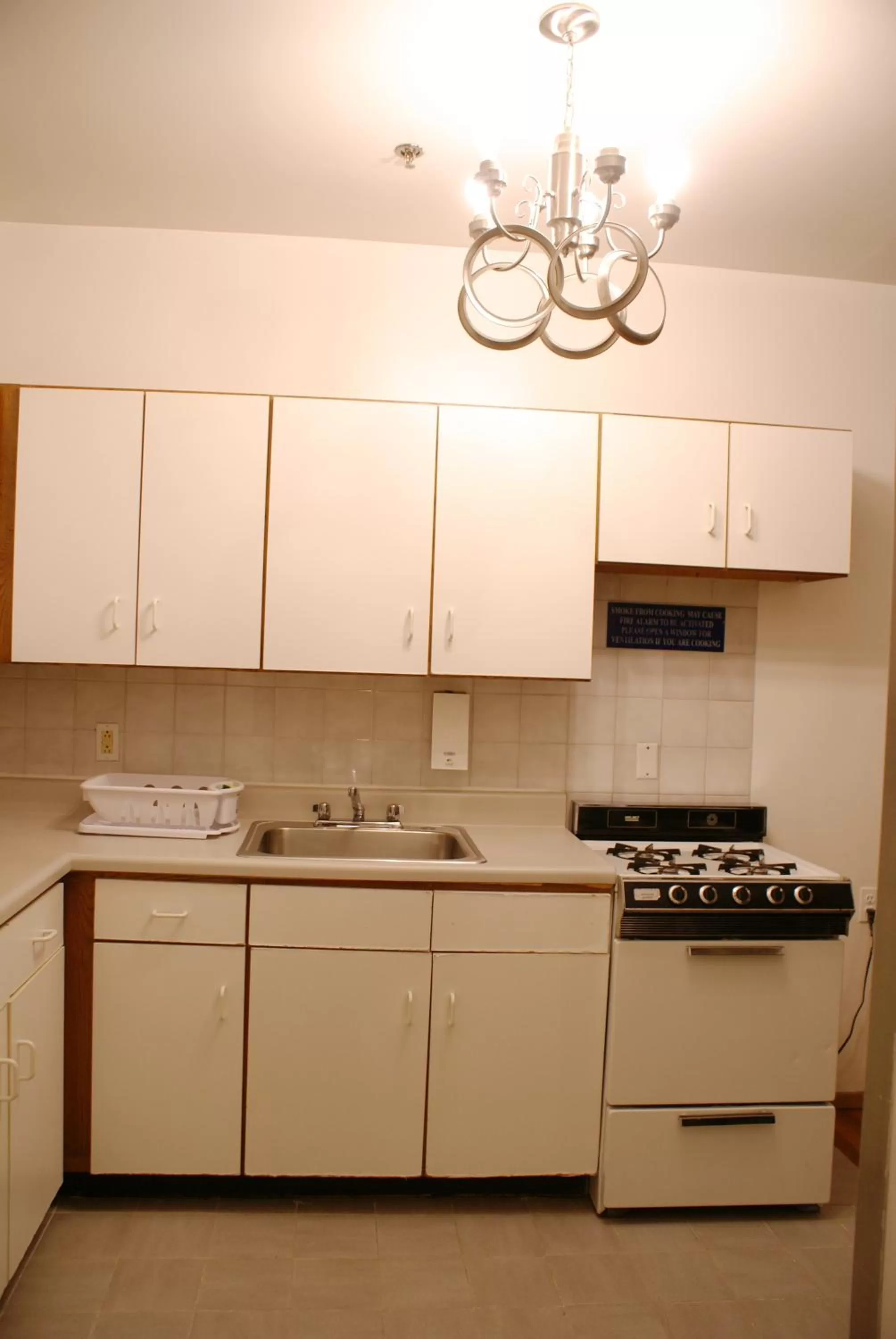 Kitchen or kitchenette in Off SoHo Suites Hotel