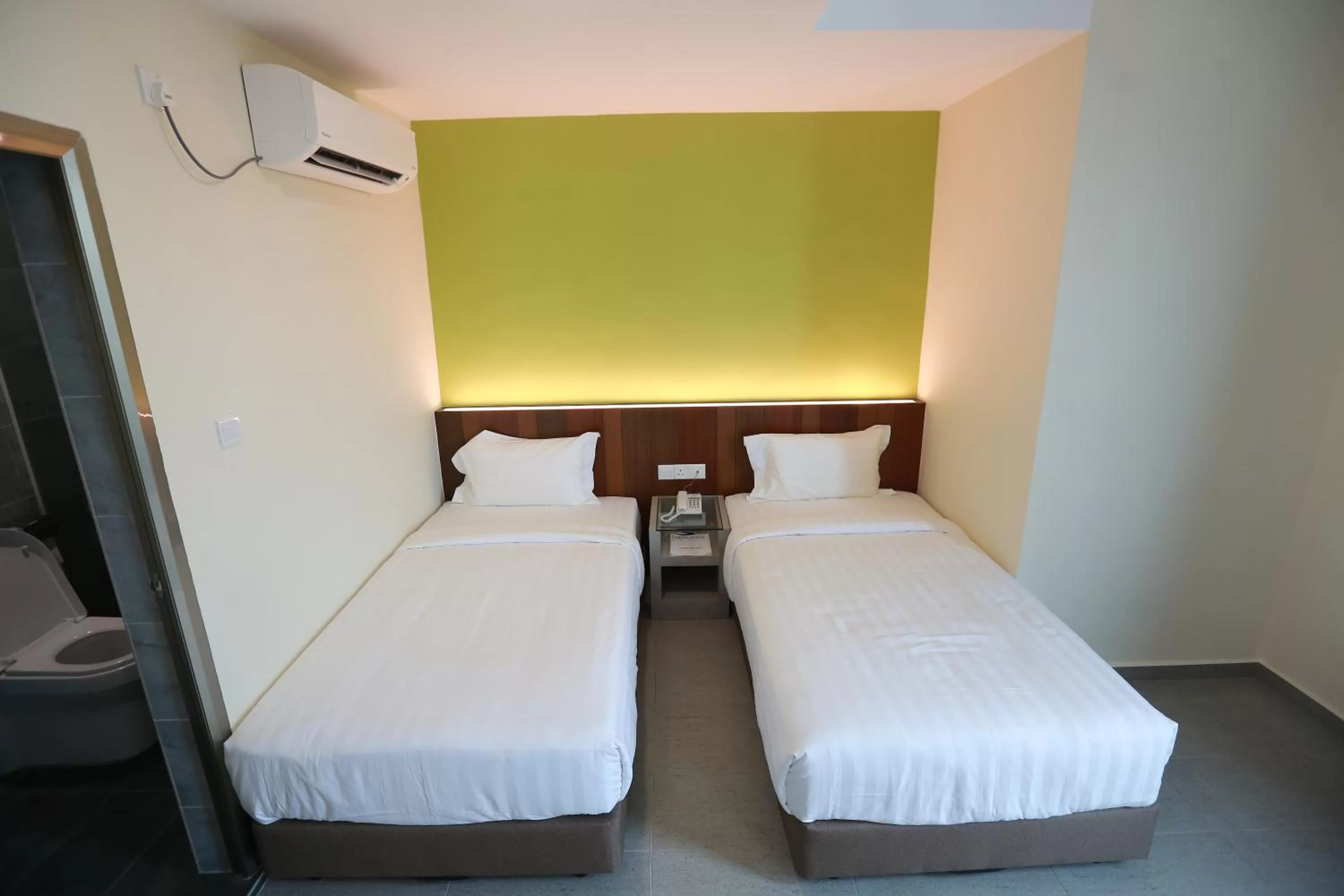 Bed in Pantai Regal Boutique Hotel