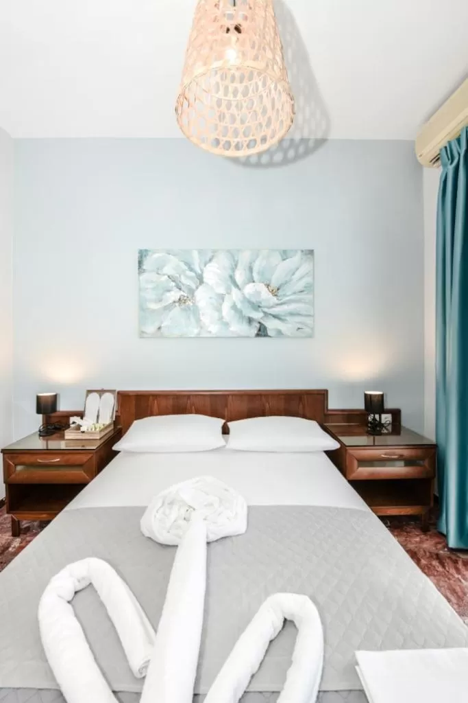 Bed in V & G Cozy Apartments