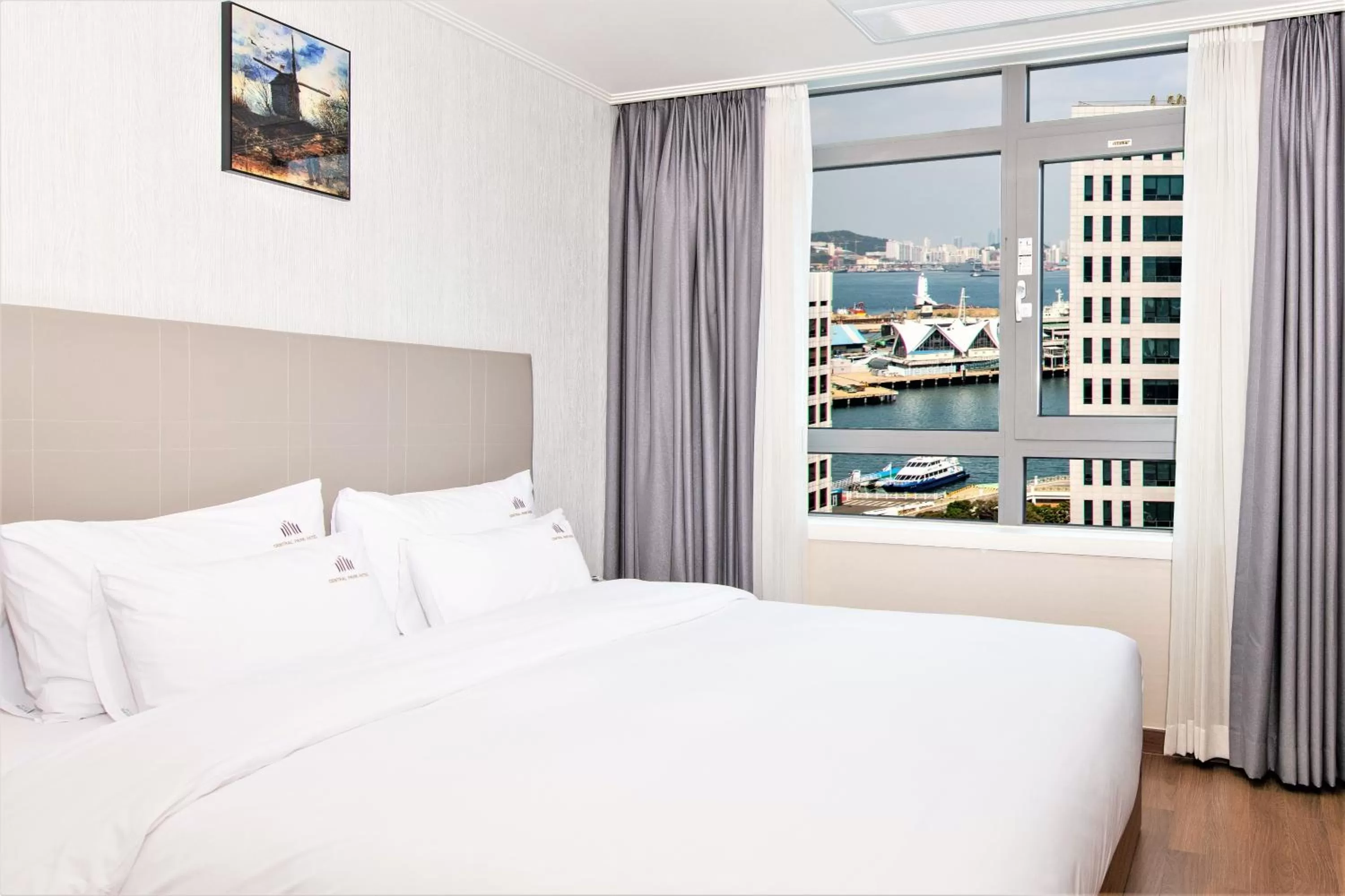 View (from property/room), Bed in Central Park Hotel Busan