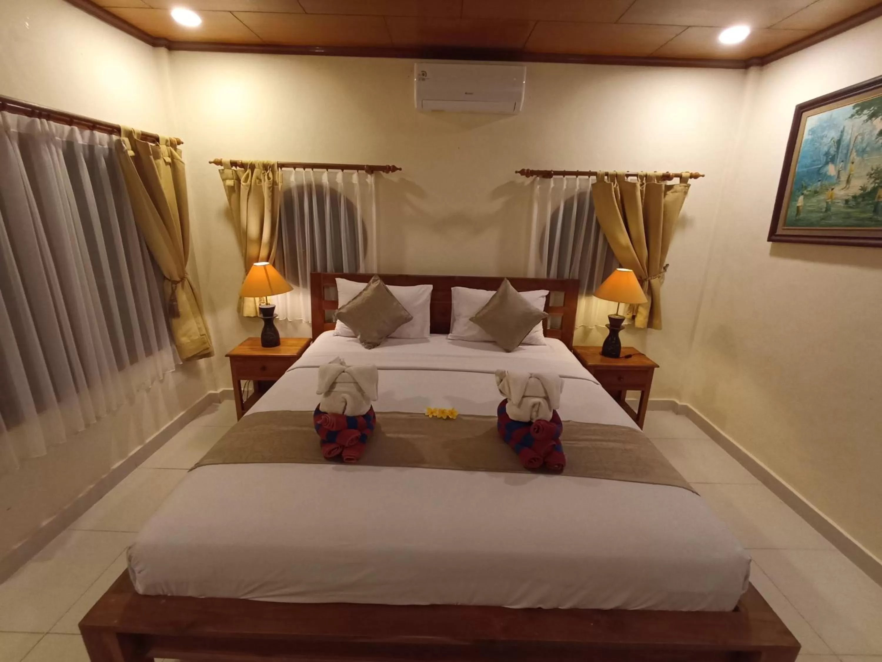 Bed in Kusnadi Hotel