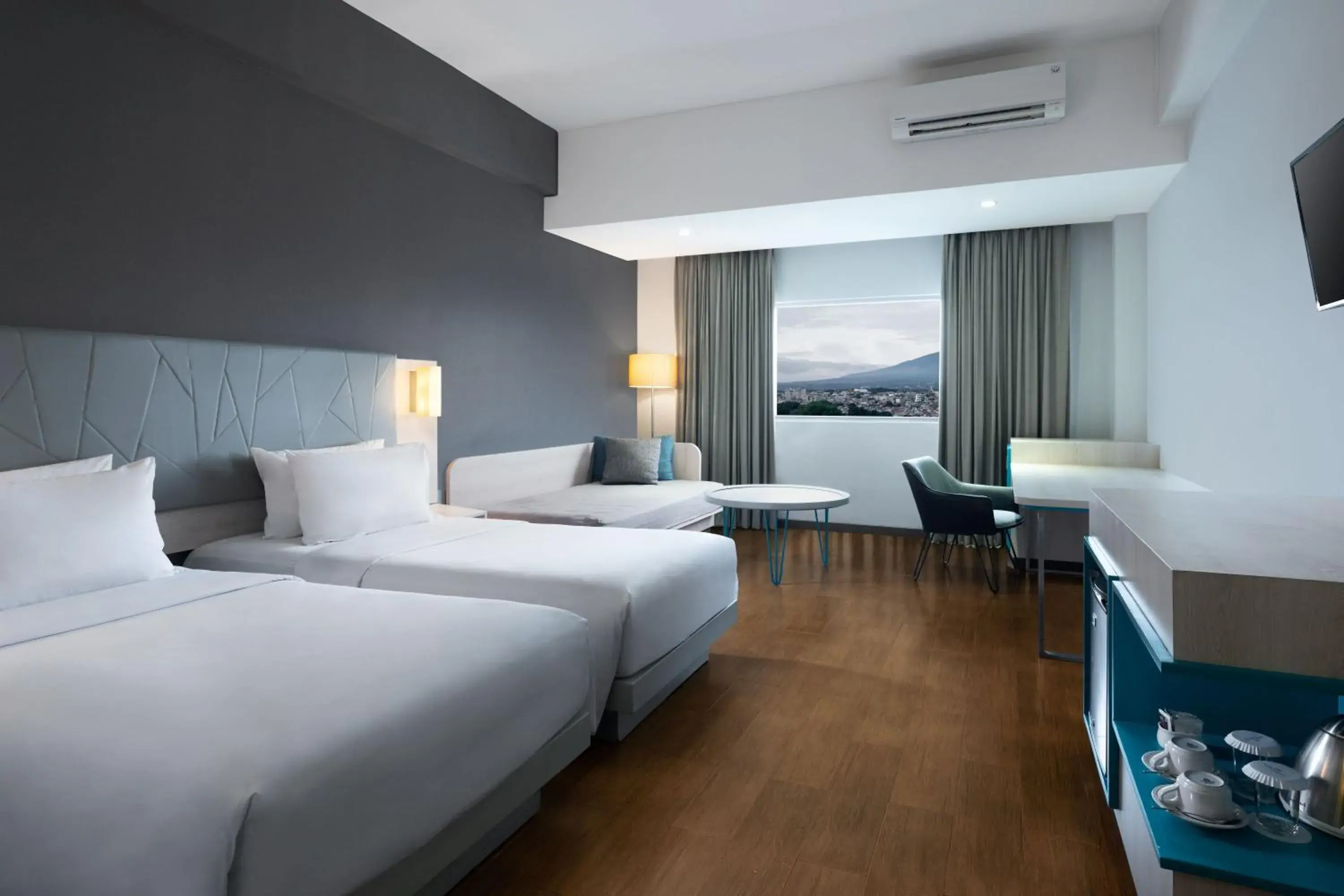 Deluxe Twin Room in Hotel Santika Bogor Deluxe Twin Room in Hotel Santika Bogor